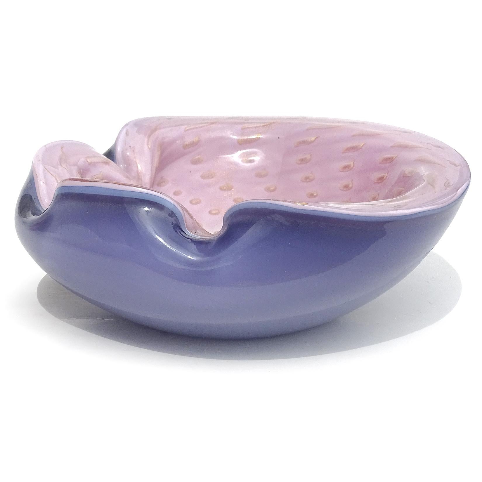 Beautiful vintage Murano hand blown blue over pink, white, gold flecks and controlled bubbles Italian art glass decorative bowl / ashtray / vide-poche. Documented to designer Alfredo Barbini, circa 1950-1960. The bowl has 3 decorative folds along