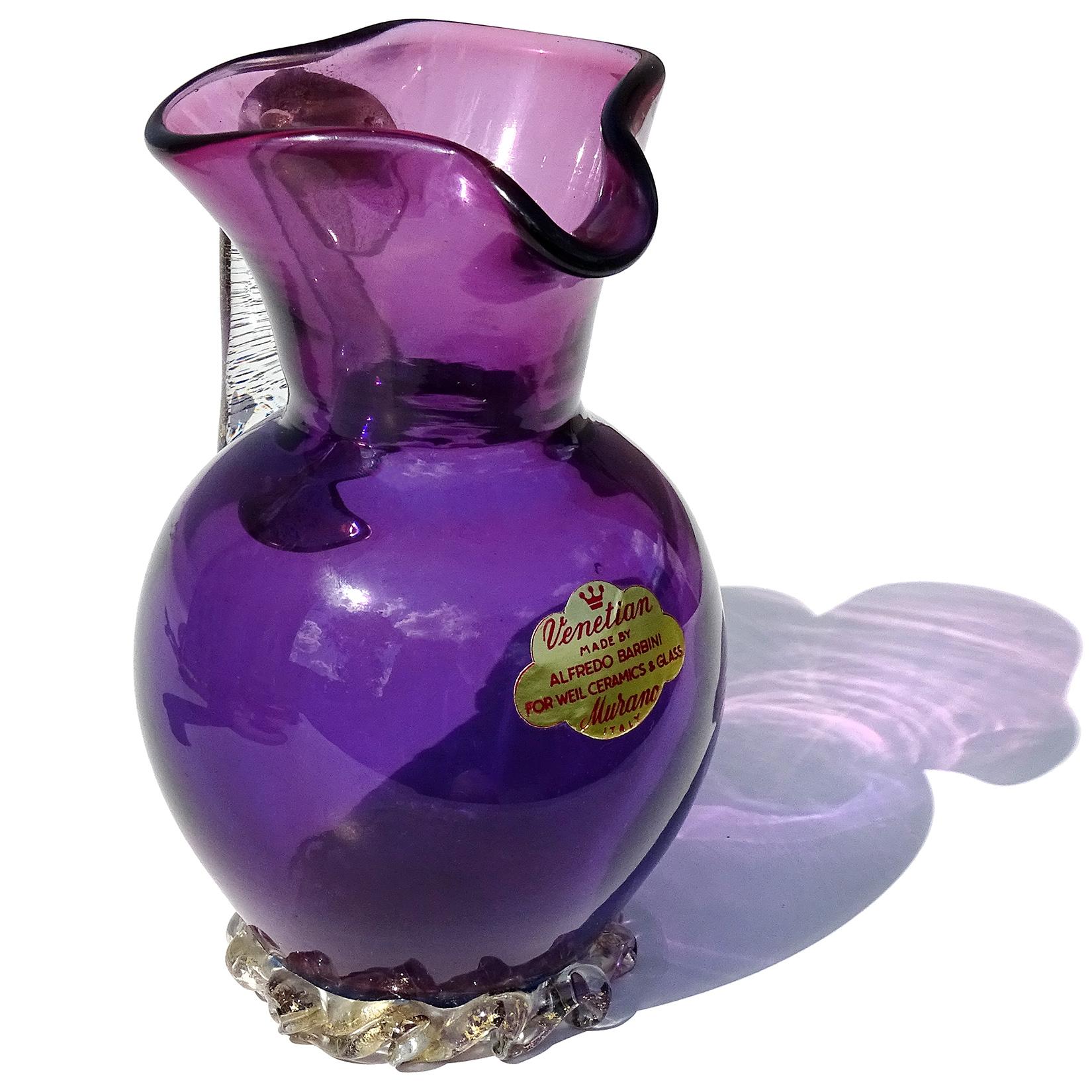Beautiful vintage Murano hand blown amethyst purple and gold flecks Italian art glass pitcher shape flower vase. Documented to designer Alfredo Barbini, with original intact 