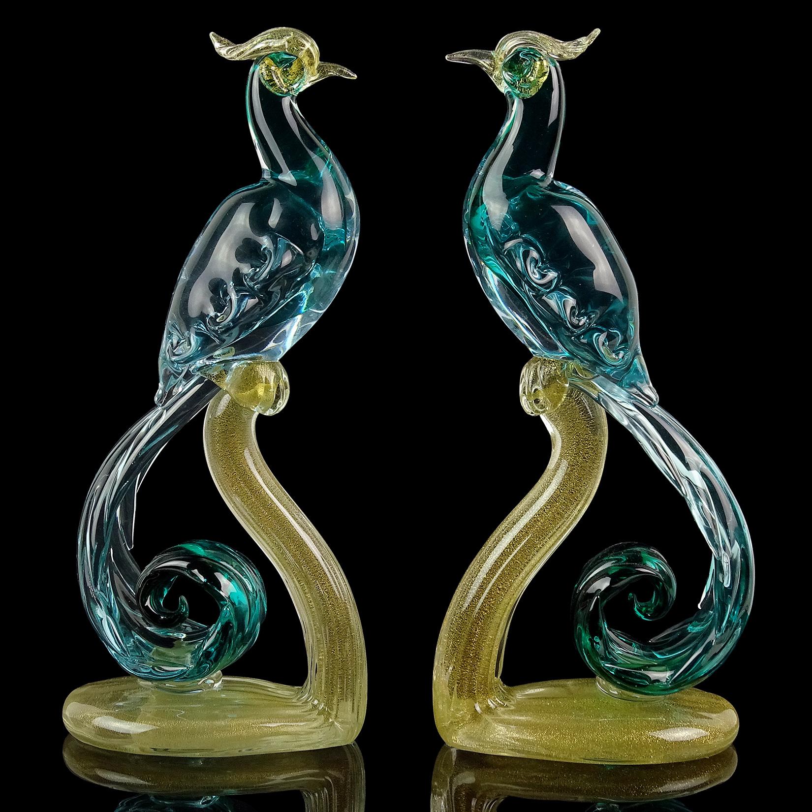 Gorgeous pair of vintage Murano hand blown Sommerso green to aqua gold flecks Italian art glass pheasants / birds sculptures. Documented to designer Alfredo Barbini. Published in his catalog. The pair is beautifully sculpted and profusely filled