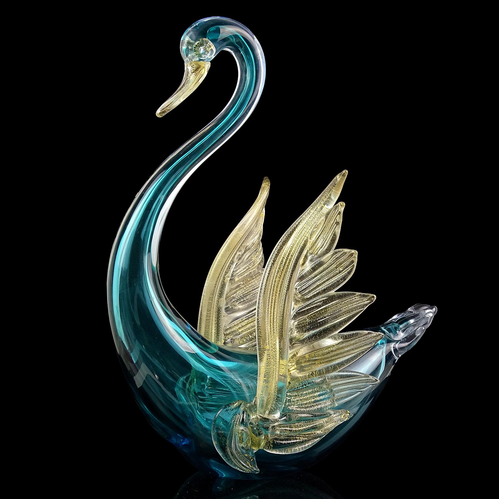 Gorgeous large Murano hand blown Sommerso cerulean / aqua blue and gold flecks Italian art glass swan centerpiece sculpture. Documented to master glass artist and designer Alfredo Barbini, circa 1950s-1960s, and published in his catalog for Weil