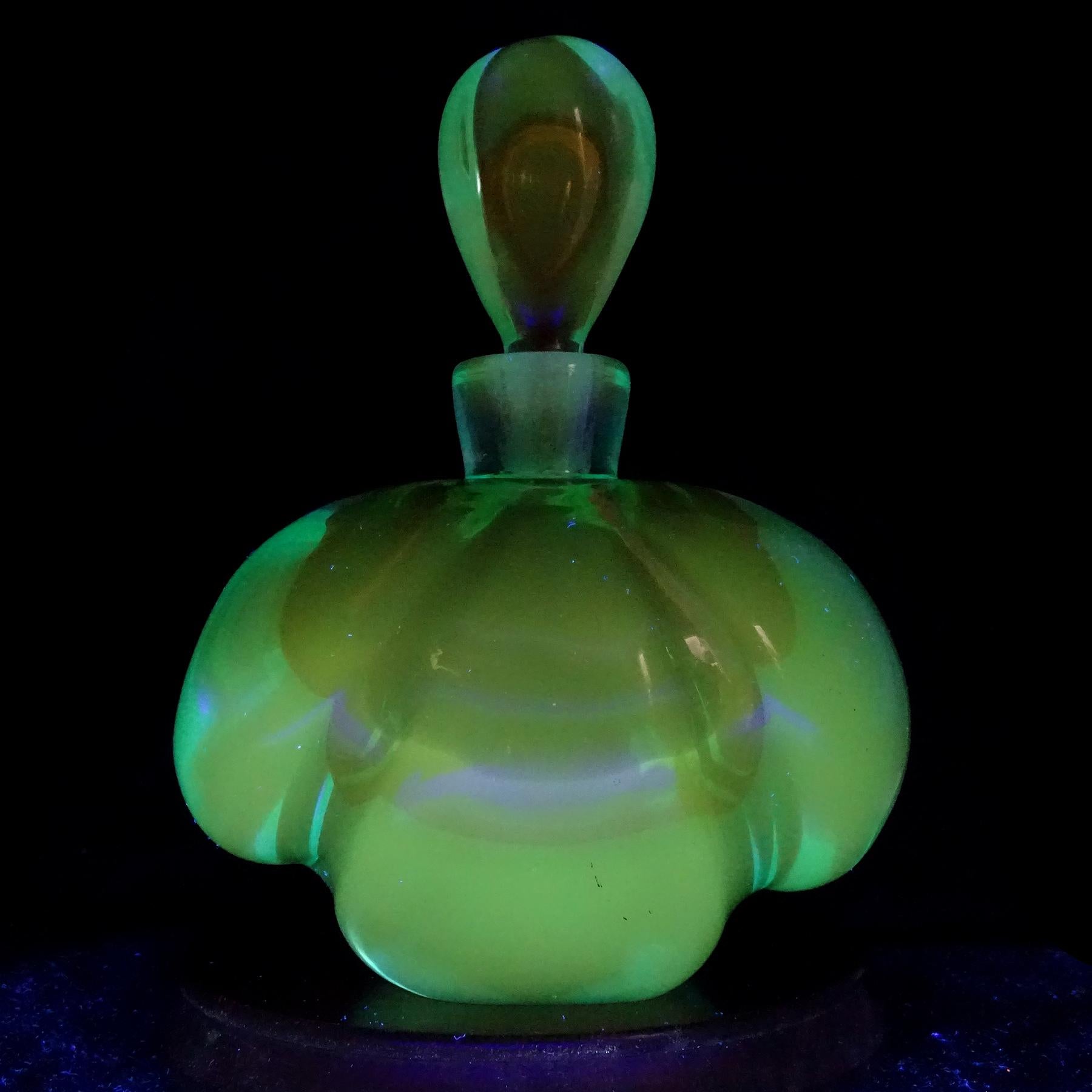 Beautiful large vintage Murano hand blown Sommerso aqua blue over orange Italian art glass perfume bottle. Documented to master glass artist and designer Alfredo Barbini. Published in his Weil Ceramics and Glass catalog. The bottle has a large