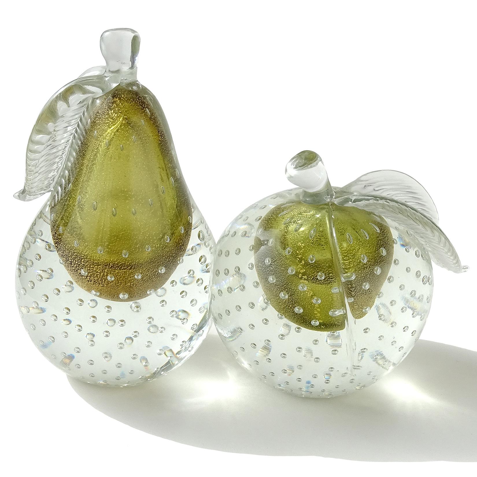 Beautiful Murano hand blown Sommerso olive green, controlled bubbles and gold flecks Italian art glass pear and apple bookends. Documented to designer Alfredo Barbini, circa 1950s-1960s and published in his vintage catalog. The pieces are very
