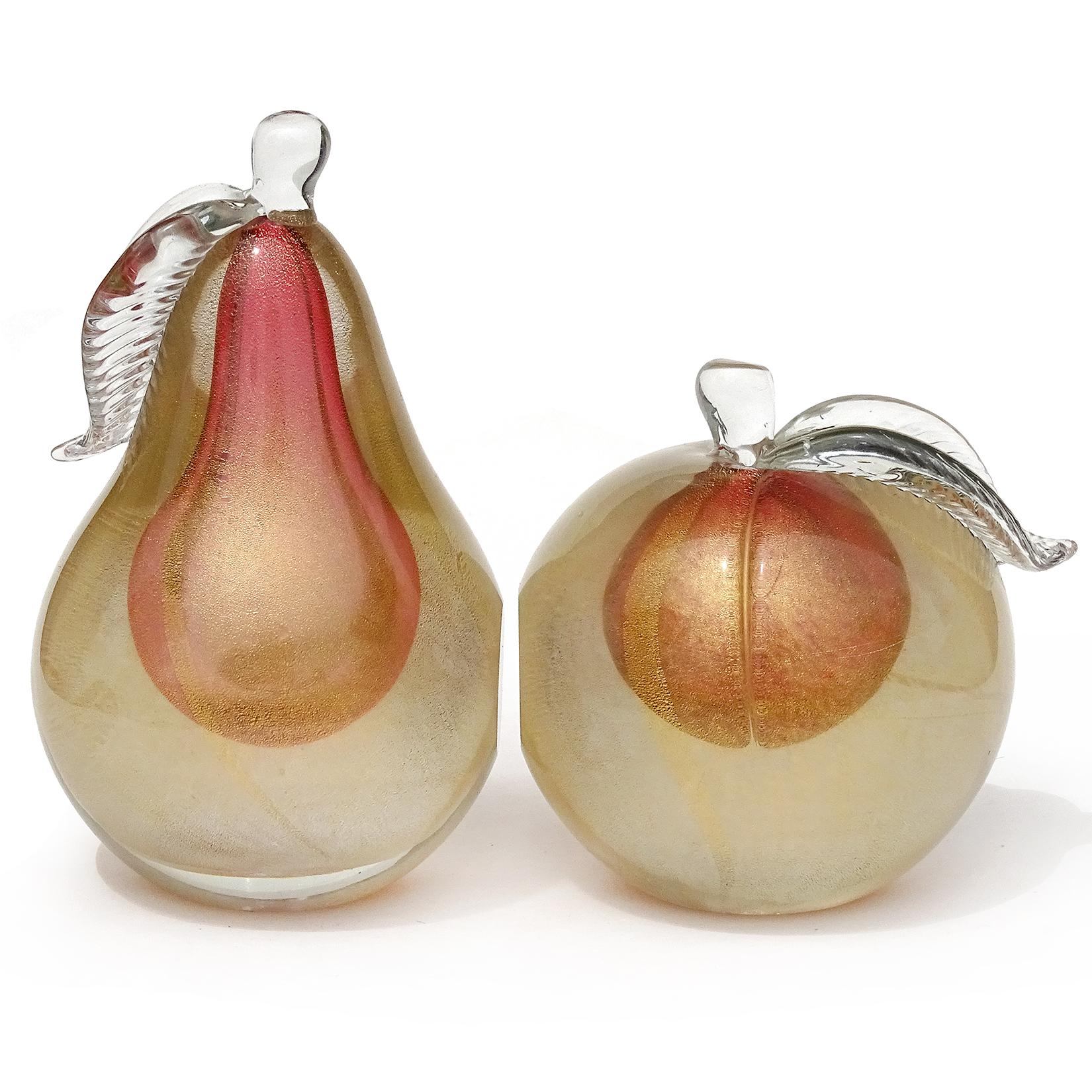 Beautiful vintage murano hand blown, Sommerso pink center with gold flecks Italian art glass pear and apple fruit bookends. Documented to designer Alfredo Barbini, circa 1950-1960. Published in his catalog. Each piece has 2 polished ends, so they