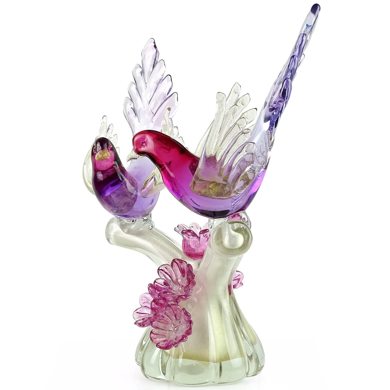 Gorgeous vintage Murano hand blown Sommerso cranberry to purple and gold flecks Italian art glass birds centerpiece / candleholder. Documented to designer Alfredo Barbini. The piece is profusely covered in gold leaf, with decorative flowers on the