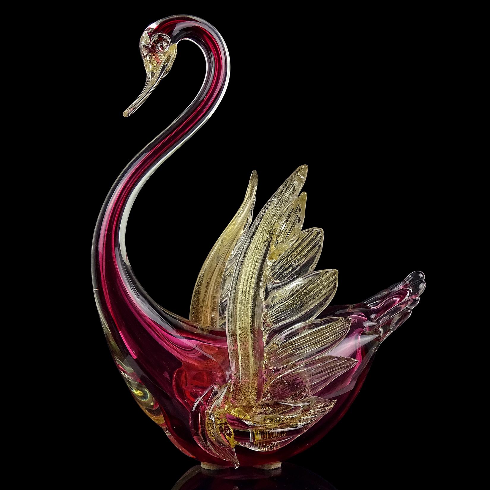 Gorgeous large vintage Murano hand blown Sommerso cranberry red and gold flecks Italian art glass swan centerpiece sculpture. Documented to master glass artist and designer Alfredo Barbini, circa 1950s-1960s, and published in his catalog for Weil