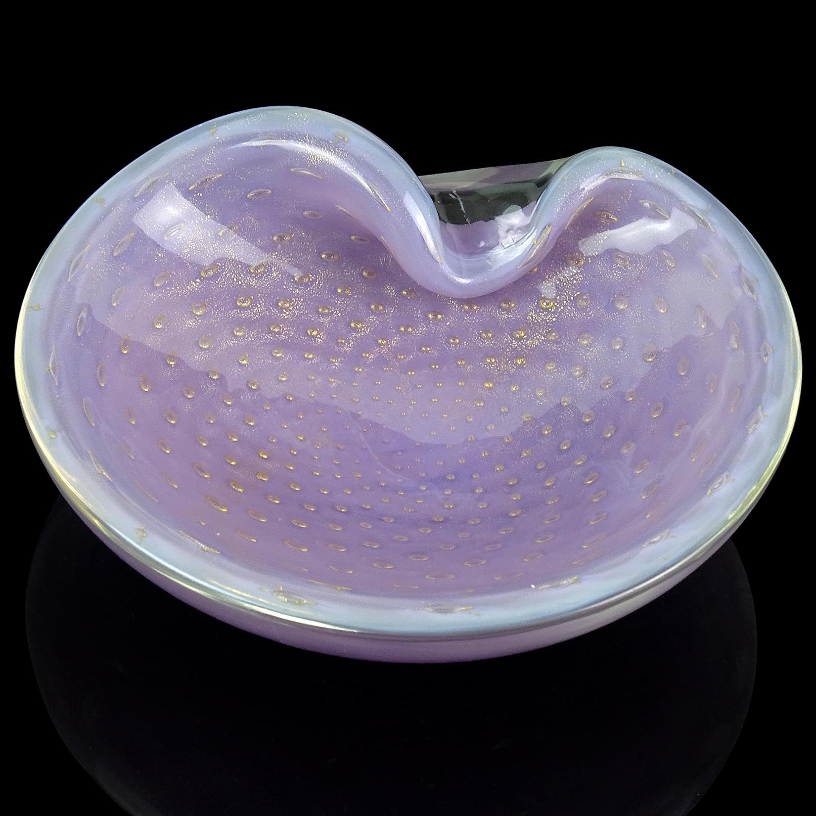 Beautiful vintage Murano hand blown opaline purple, controlled bubbles and gold flecks Italian art glass bowl / vide poche. Documented to designer Alfredo Barbini. Profusely covered in gold leaf, with the gold clinging to each of the bubbles. Has a