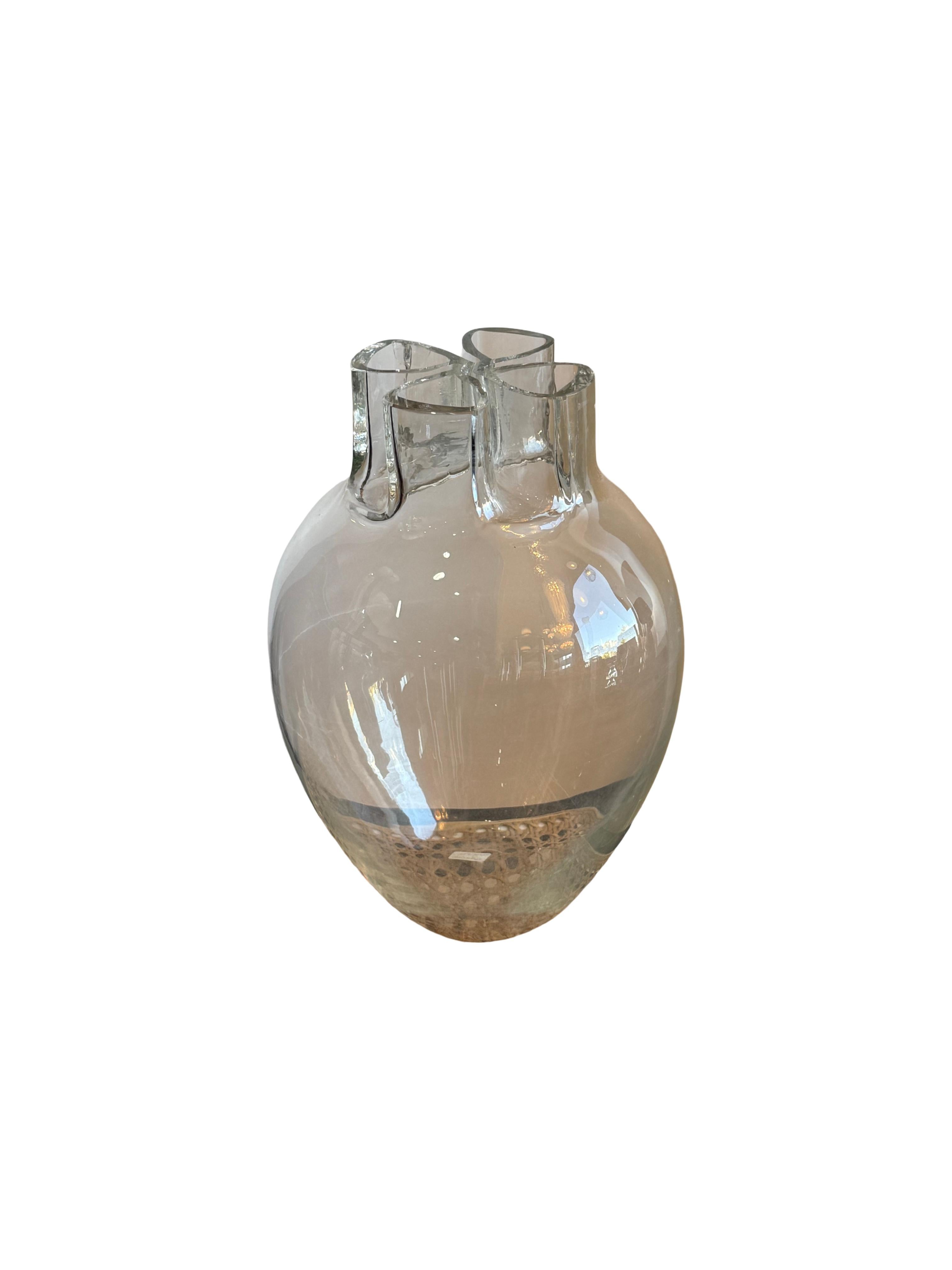 Sculptural Murano glass vase by Barbini in clear finish, 1970s

This sculptural clear Murano glass vase by Barbini, dating to the 1970s, embodies the refined artistry of Venetian glassmaking. The hand-blown form features a bulbous base with an