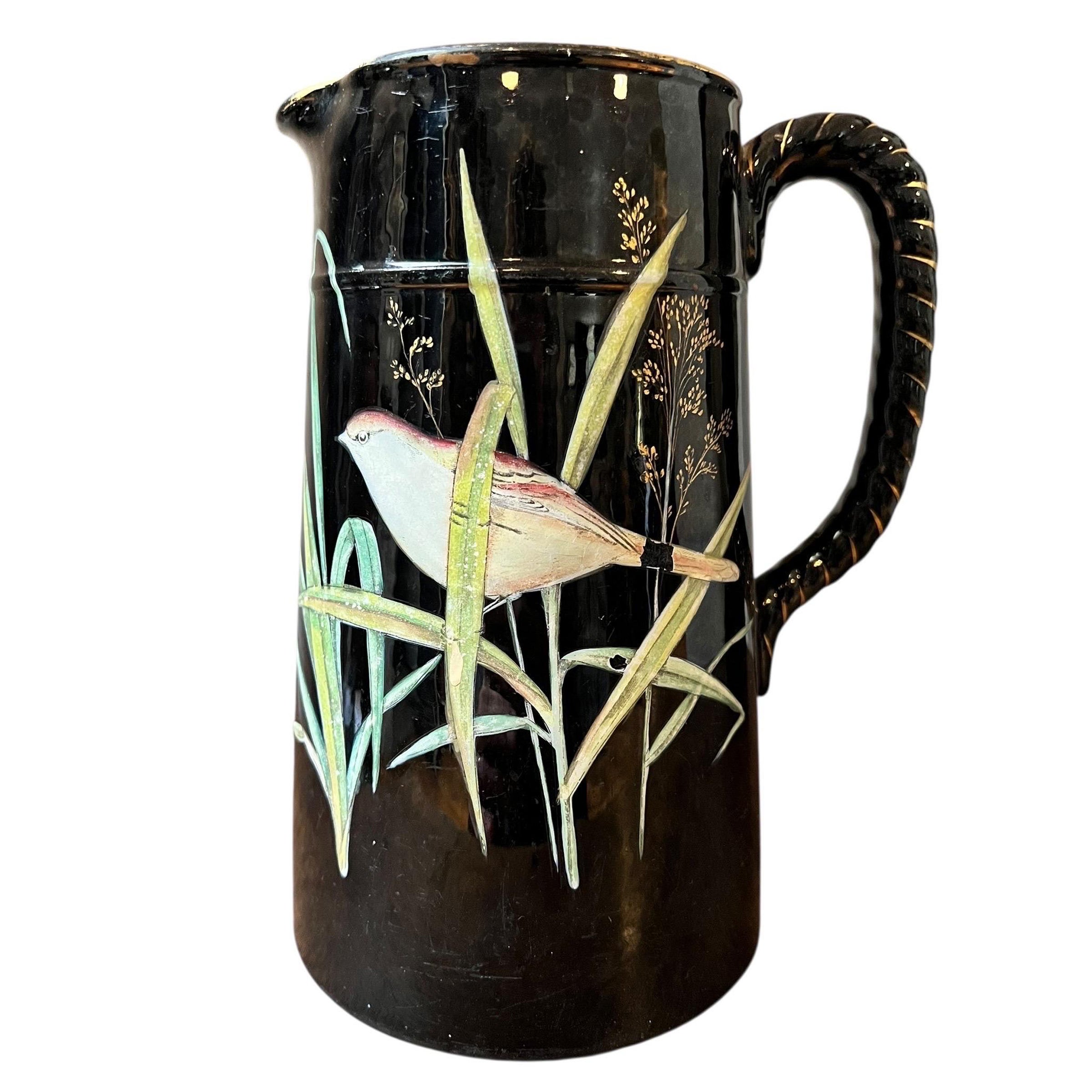 “Barbotine” earthenware pitcher with Japanese-style decoration – France, circa 1