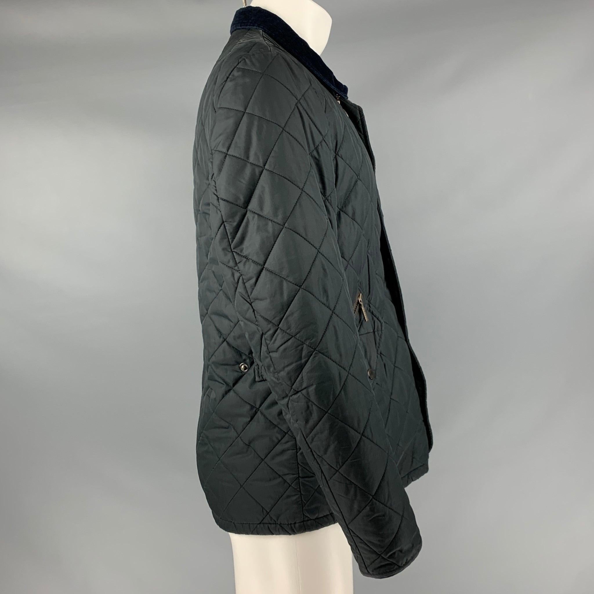 BARBOUR
jacket in a black fabric featuring a quilted style, two pockets, and a zips and snaps closure.Excellent Pre-Owned Condition. 

Marked:   S 

Measurements: 
 
Shoulder: 17 inches Chest: 38 inches Sleeve: 24.5 inches Length: 28.5 inches 
  
 