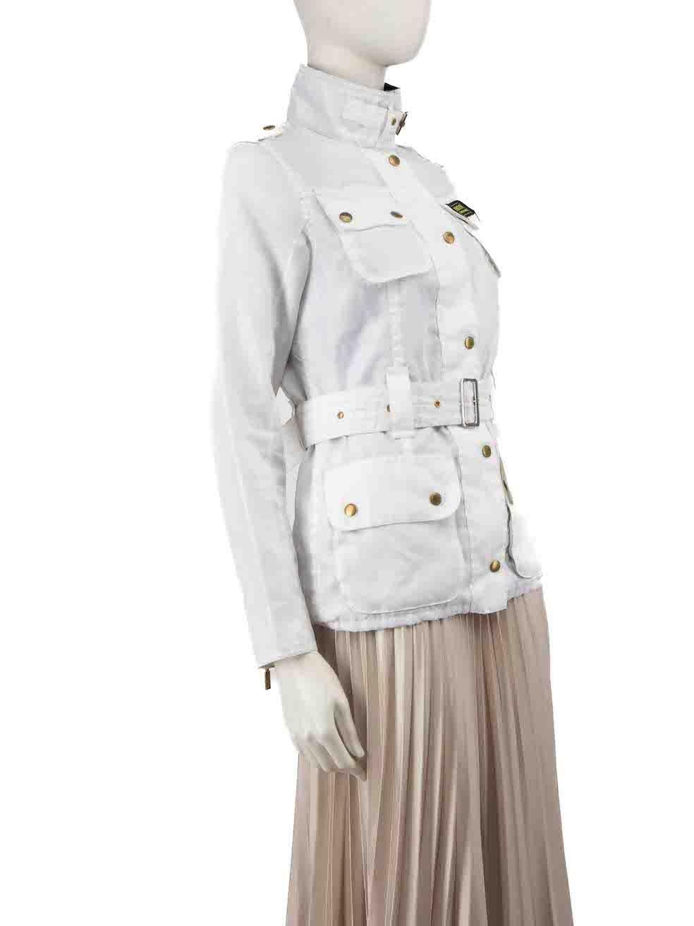 CONDITION is Very good. There is a small mark to the front right side pocket on this Barbour designer resale item.
 
 
 
 Details
 
 
 White
 
 Polyester
 
 Jacket
 
 Waxed fabric
 
 Zip and snap button fastening
 
 Neck and waist belt
 
 4x