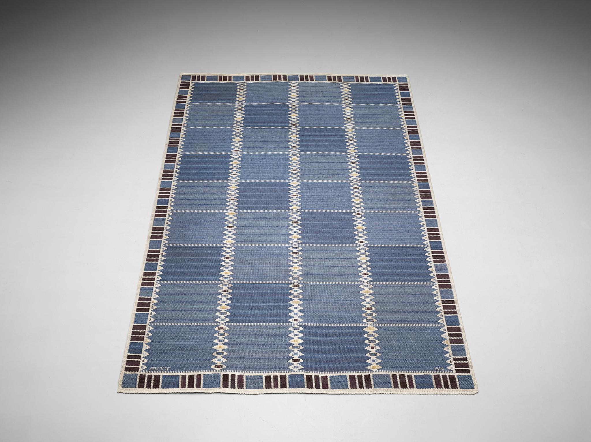 Barbro Nilsson for AB Märta Måås-Fjetterström, carpet, model ‘Salerno’, wool on linen warp, Sweden, design 1948  

Exceptional hand-woven, blue-toned carpet designed by the celebrated Swedish textile designer Barbro Nilsson in 1948. This particular