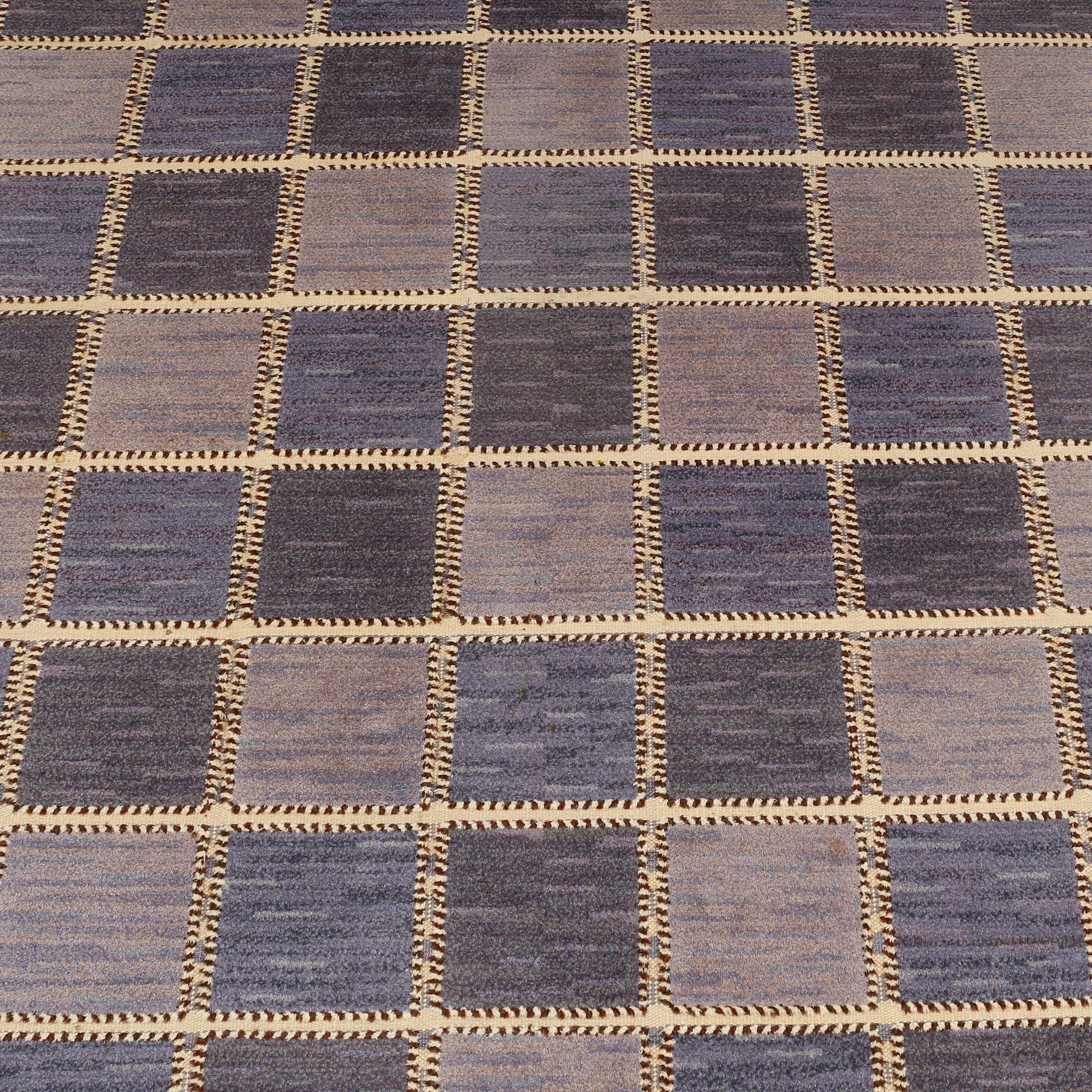 Large Barbro Nilsson 'Gyllenrutan, blå' (The Golden Square, blue)' carpet. Designed 1945. Handwoven wool on a linen warp.

Produced by Märta Måås-Fjetterström AB, Båstad. Carpet with manufacturer’s mark AB MMF and artist’s initials