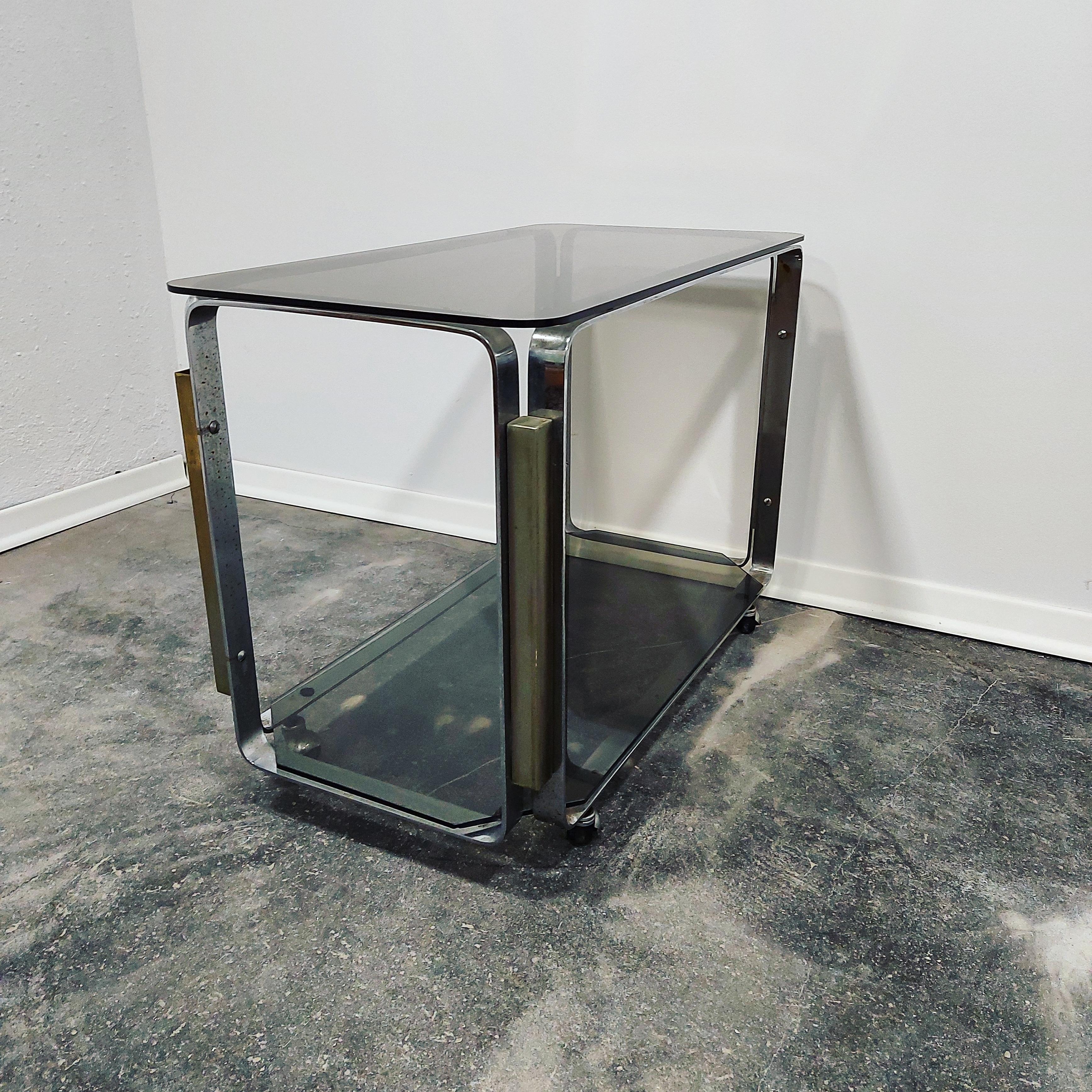 Unique Barcart from 1970s with wheels

Material: Stainless steel, Smoked glass
