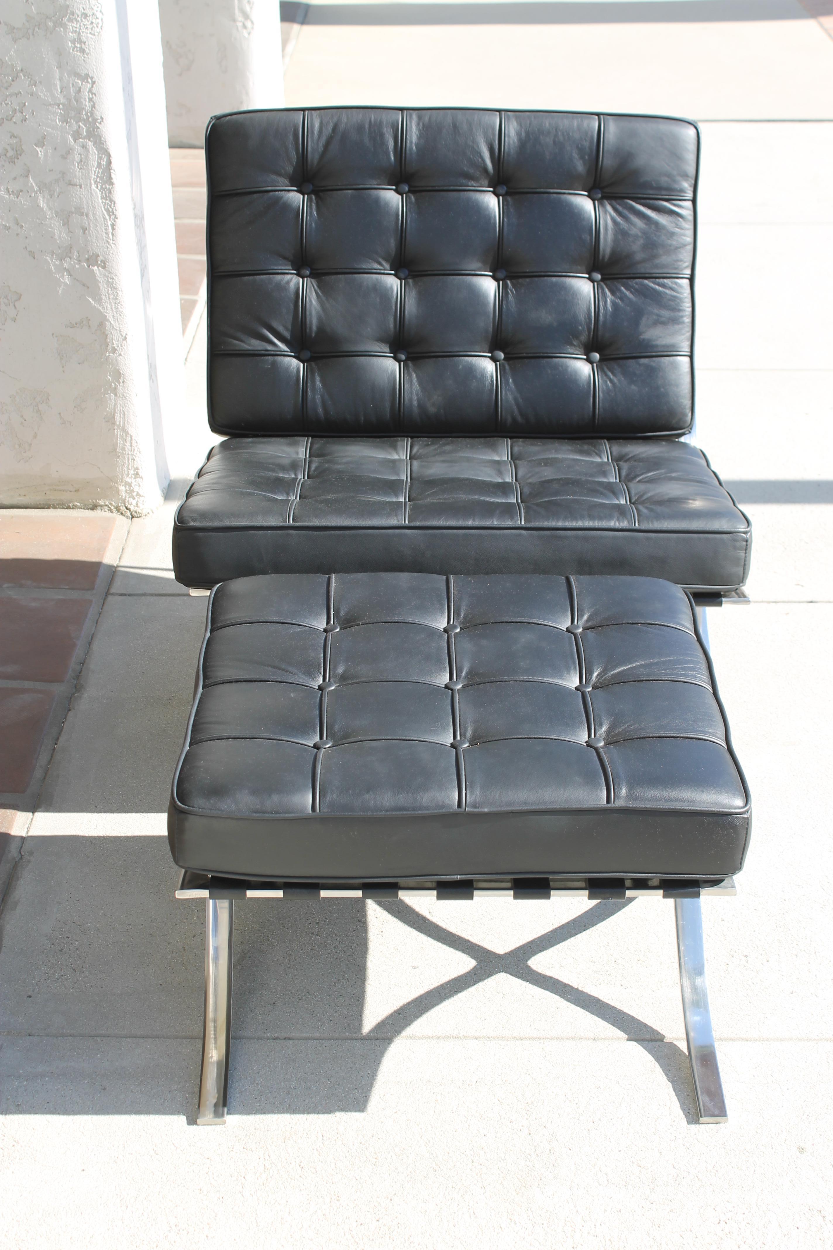 Barcelona chair and ottoman. These are a high quality reproduction. Chair frame measures 29.5