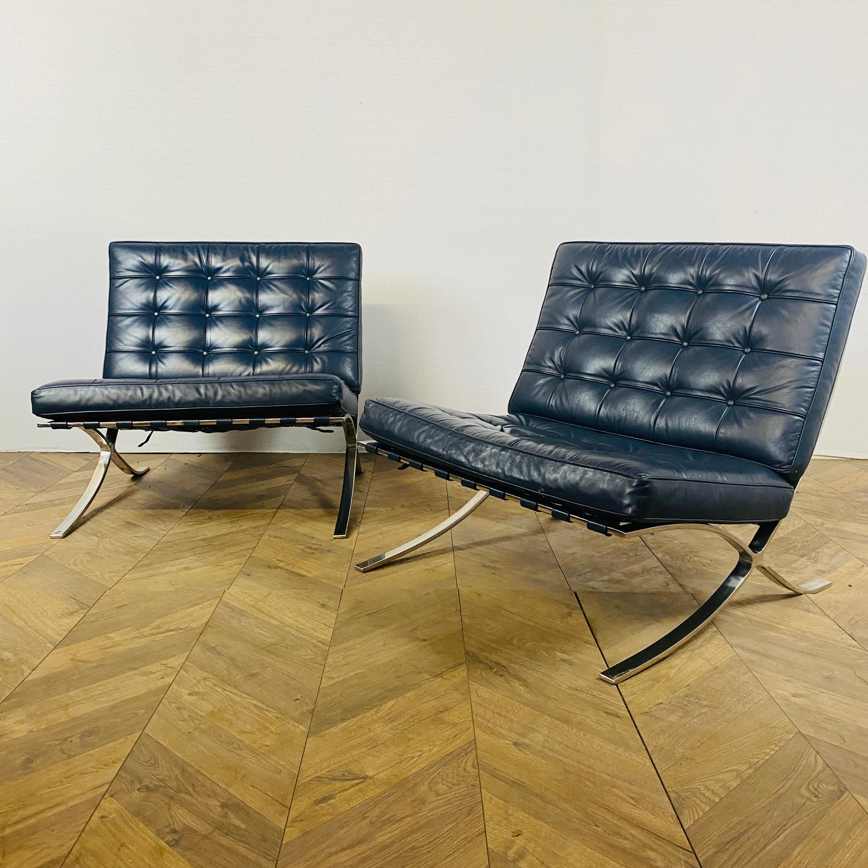 A pair of beautifully Proportioned occasional chairs, Designed by Renowned Designer & Architect Ludwig Mies Van Der Rohe for the German Pavilion at the Barcelona Exhibition of 1929.

These chairs date to the 1980s and finished in rare navy blue