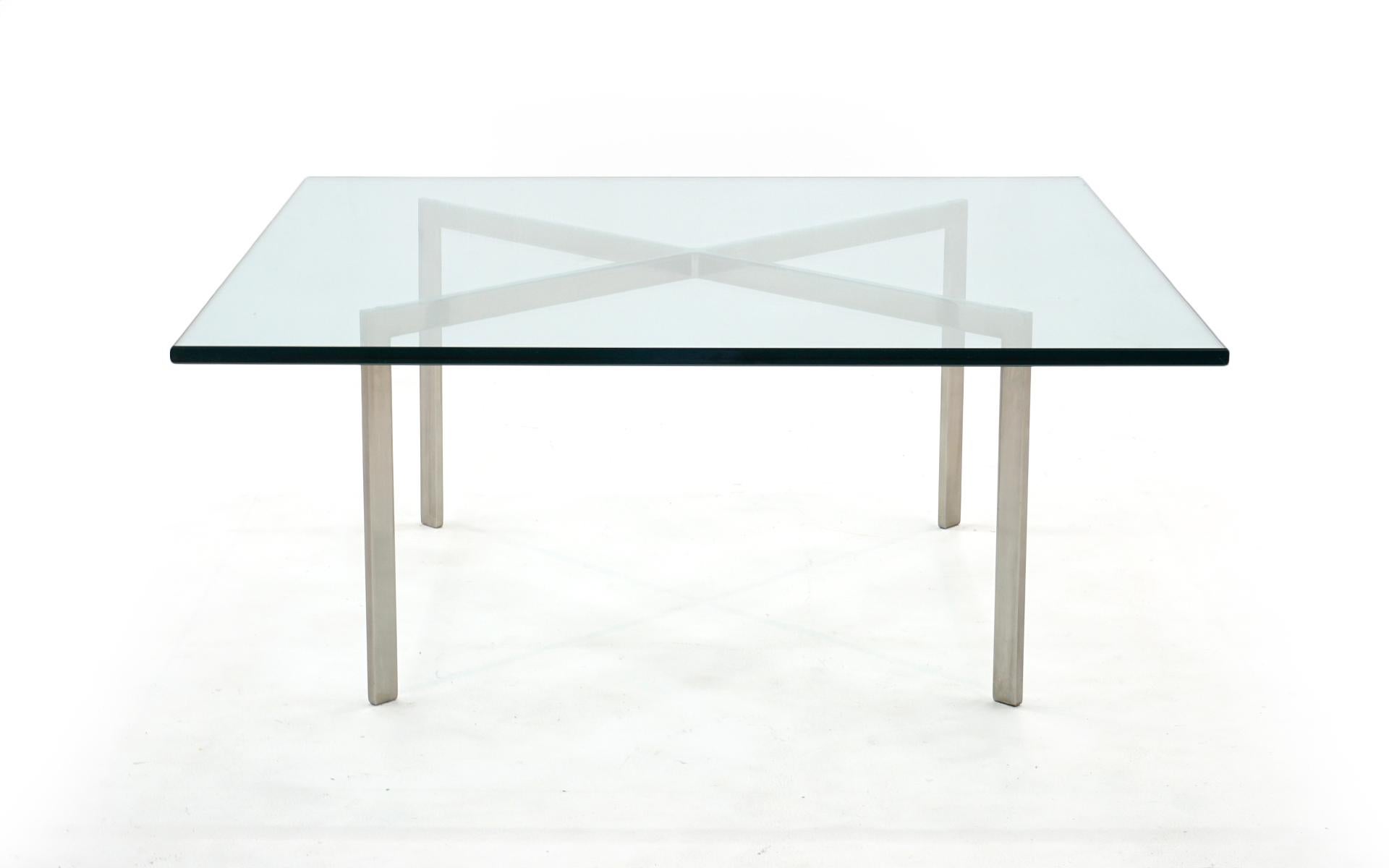 Early 1960s Ludwig Mies van der Rohe Barcelona coffee table. Solid stainless steel frame with the original glass top. No chips, cracks or repairs. No significant scratches. This is the best early example of this iconic table to come through our