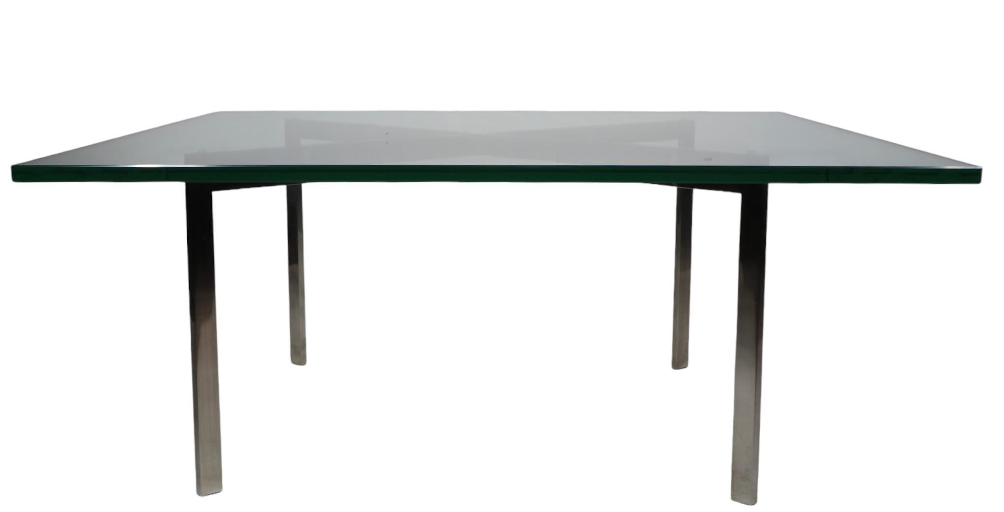 Iconic Barcelona  Modernist coffee table from Mies van der Rohe.  Well crafted, constructed of high quality materials, probably made in Italy, circa 1970's. This example is in excellent, original, clean and ready to use condition, surprisingly even