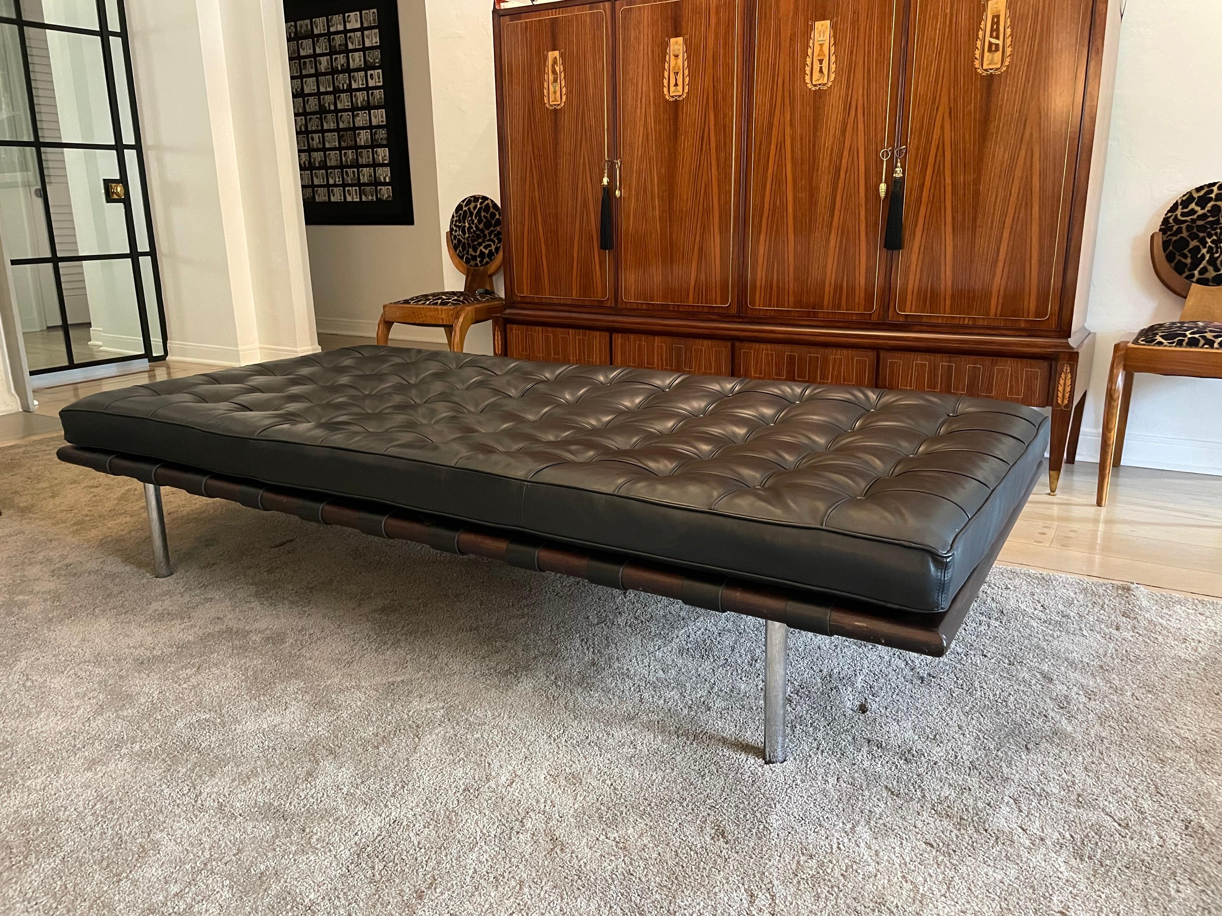 Black leather daybed designed by Ludwig Mies van der Rohe during the late 1920s with Roll pillow that straps to the bed cushion.

This piece was originally designed for use in the German Pavilion during the 1929 International Exposition in