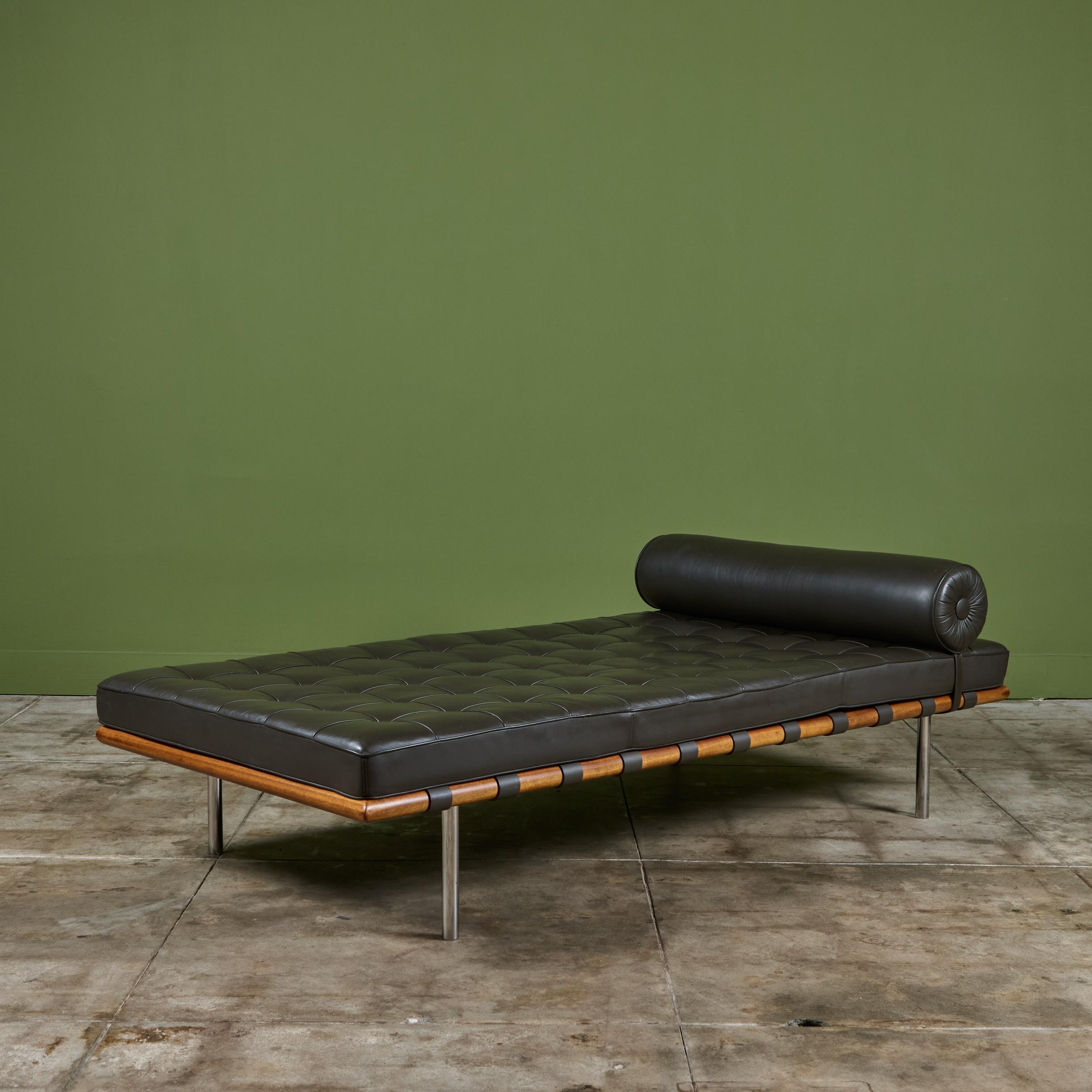 The iconic Barcelona daybed from Ludwig Mies van der Rohe originally designed in the 1930s and remade for Knoll International in the 2000s, this daybed is timeless. The daybed or couch features a dark olive-gray leather tufted cushion with matching