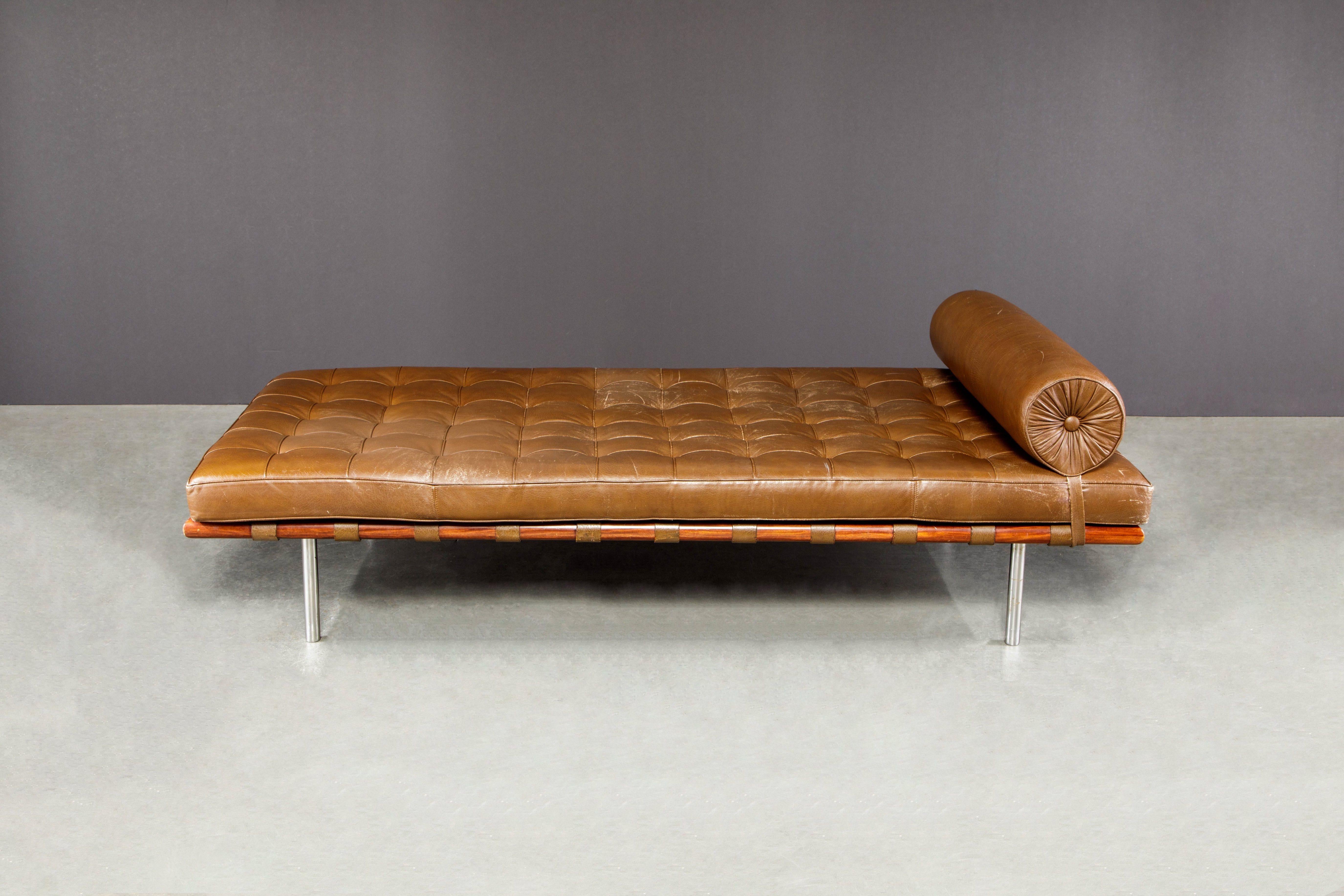 This iconic and authentic (both the leather cushion and the Mahogany frame is signed with Knoll International labels) daybed is the 'Barcelona Daybed' also referred to as the 'Barcelona Couch' by Ludwig Mies van der Rohe for Knoll International and