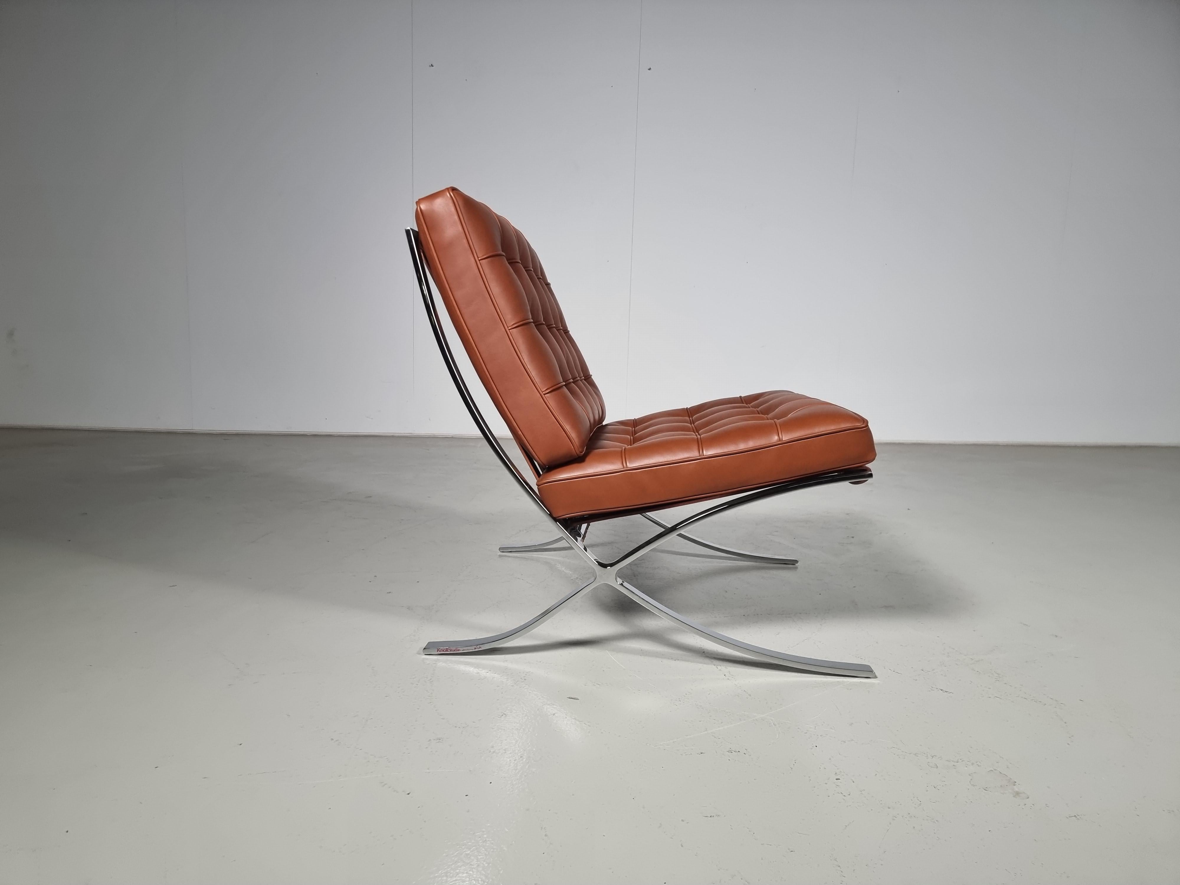 Barcelona chair in  brown leather, Mies van der Rohe, Knoll International

Originally designed in 1926 for the International Exposition, the Barcelona chair was reconfigured in 1950 from a two-part bolted frame to a single stainless steel frame as