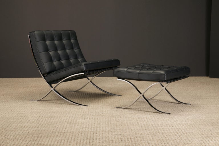 This classic black leather 'Barcelona' lounge chair and ottoman by Ludwig Mies van der Rohe for Knoll Studios is double-signed on each piece, with Knoll Inc labels to the seat cushions and Knoll Studio embossing with Mies van der Rohe signatures