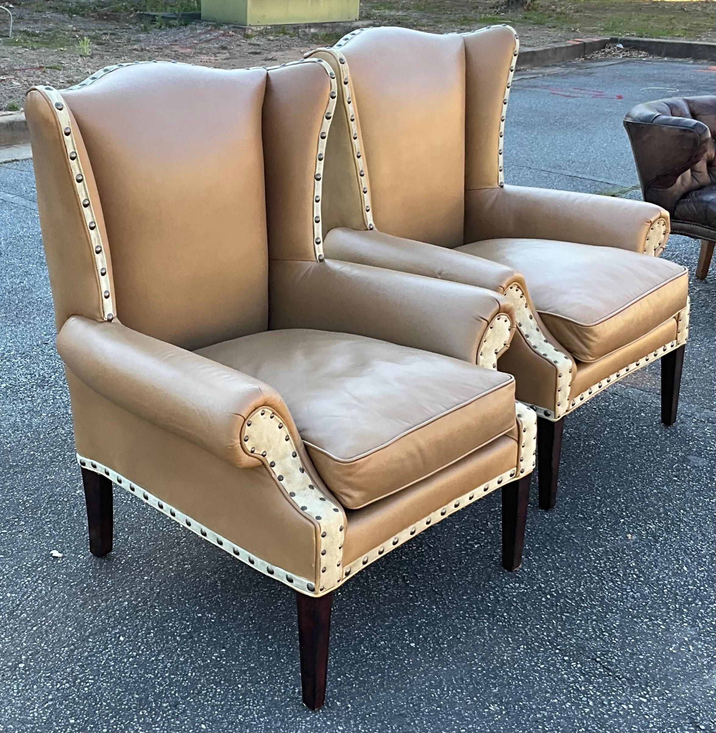 This is a pair of leather and suede wingback chairs designed by Barclay Butera for Baker Furniture Company. They are in very good condition with lite wear. They are marked and date to 2010.

Shipping is running a little slower than usual.