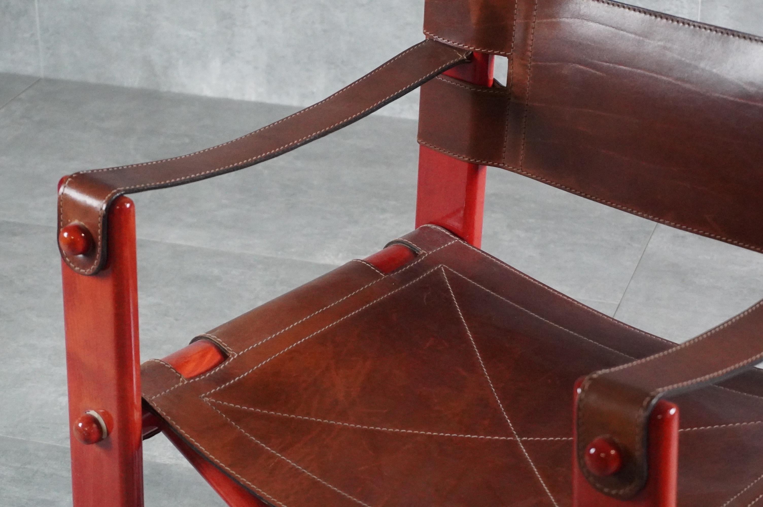 Mid-Century Italian design classic from Poltronova. The ''Bardella'' chair combines natural leather and solid wood in a sculptural structure. Rare and collectible.