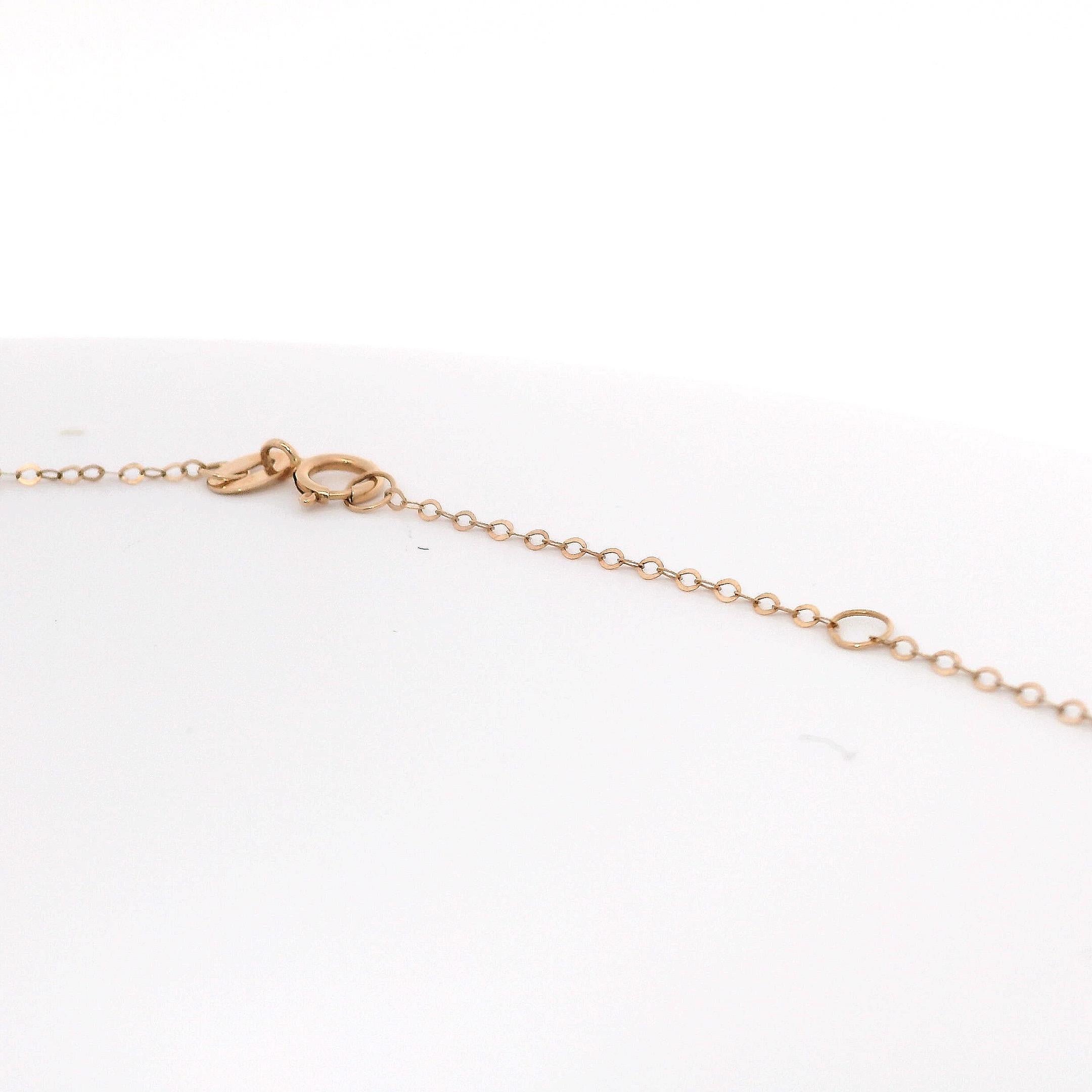 Treat yourself to a touch of elegance and sophistication with this 18K rose gold and diamond necklace. Subtle sparkles from polished rose gold links are accented by the shine of two round-cut diamonds totaling 0.191 carats. The centerpiece diamond