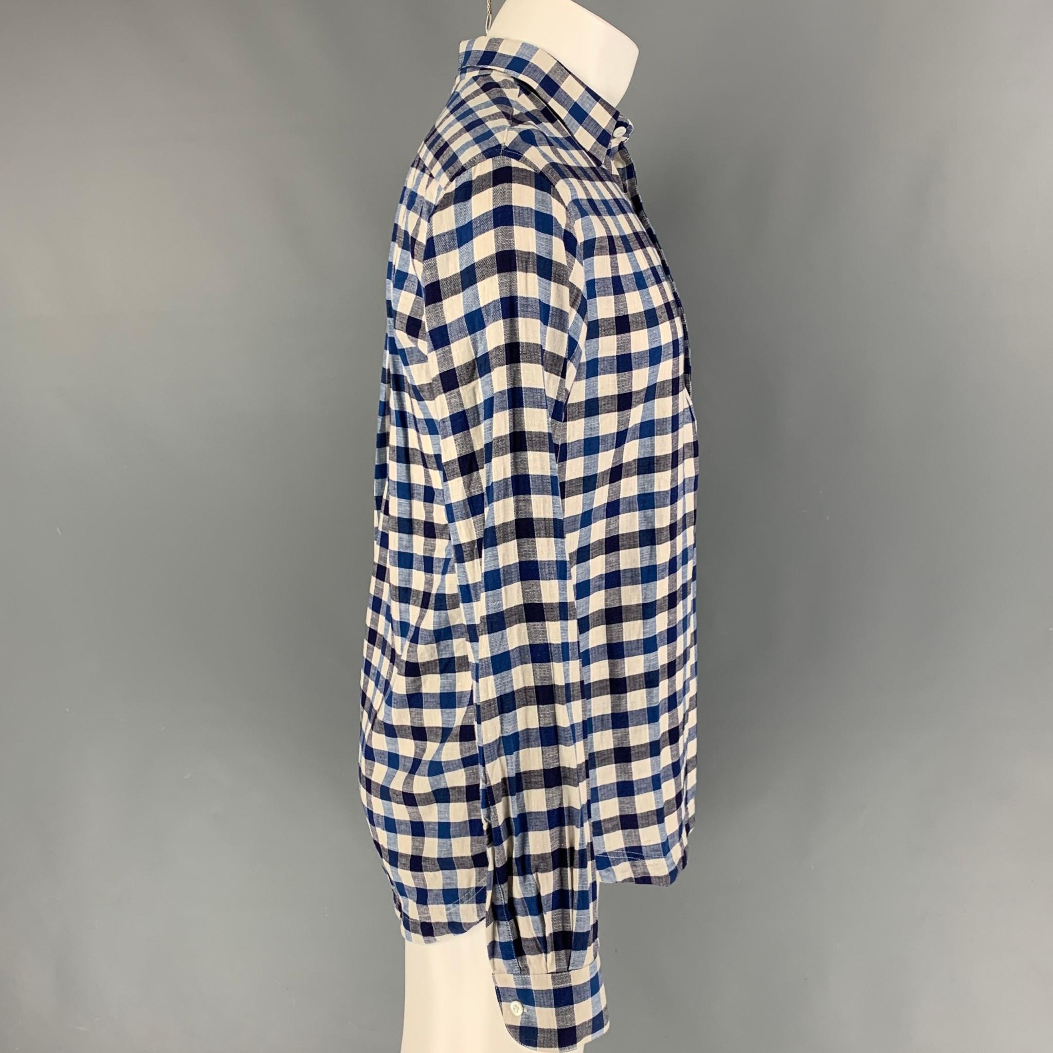 BARENA long sleeve shirt comes in a blue & white checkered material featuring a spread collar and a half buttoned closure. 

Very Good Pre-Owned Condition.
Marked: 46

Measurements:

Shoulder: 18 in.
Chest: 38 in.
Sleeve: 26 in.
Length: 30 in. 
