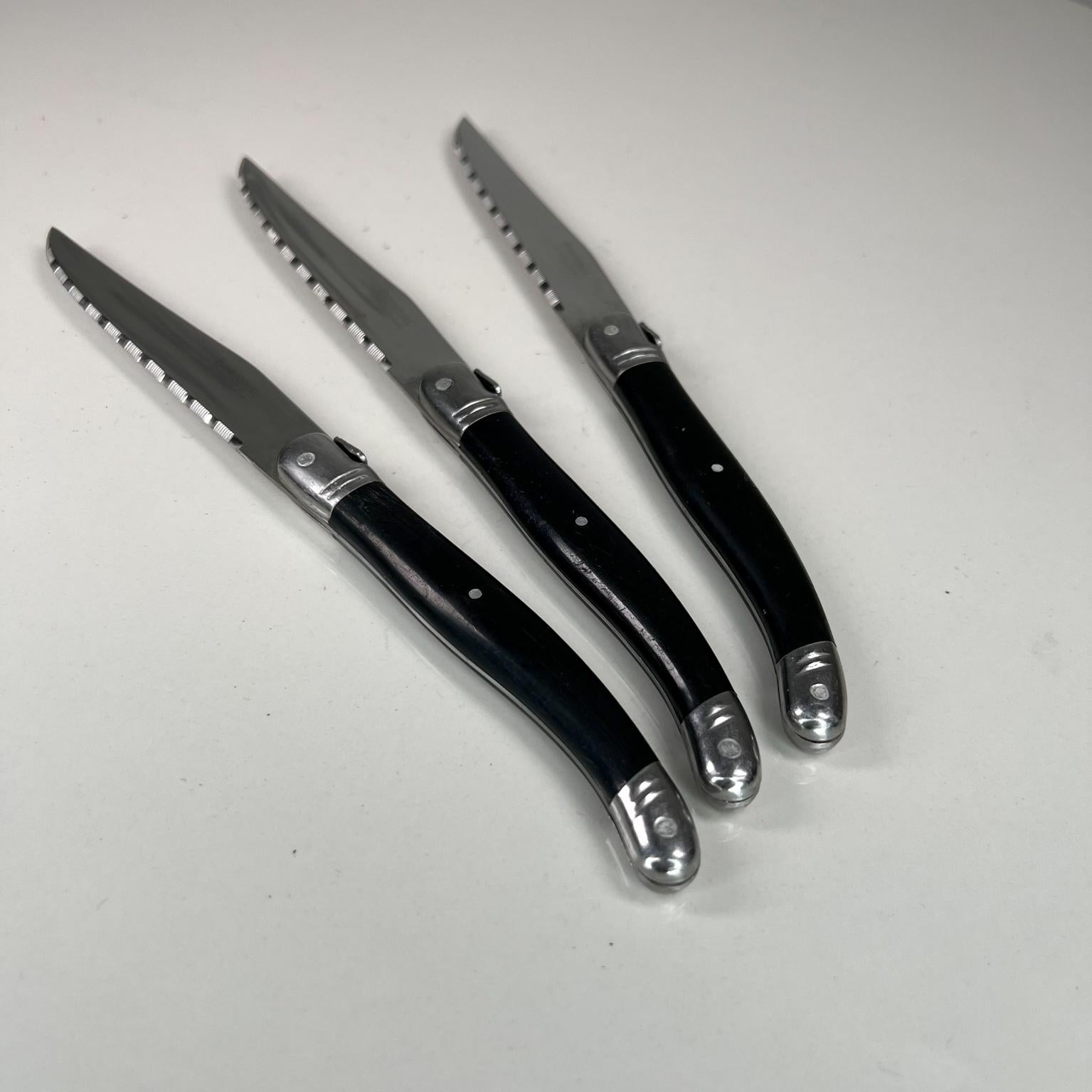 Laguiole Barenthal stainless black flatware 3 knives Jean Dubost L'Artet La Table France.
Stainless steel
9 long x .5 x .5
Preowned vintage condition.
See images please.
 