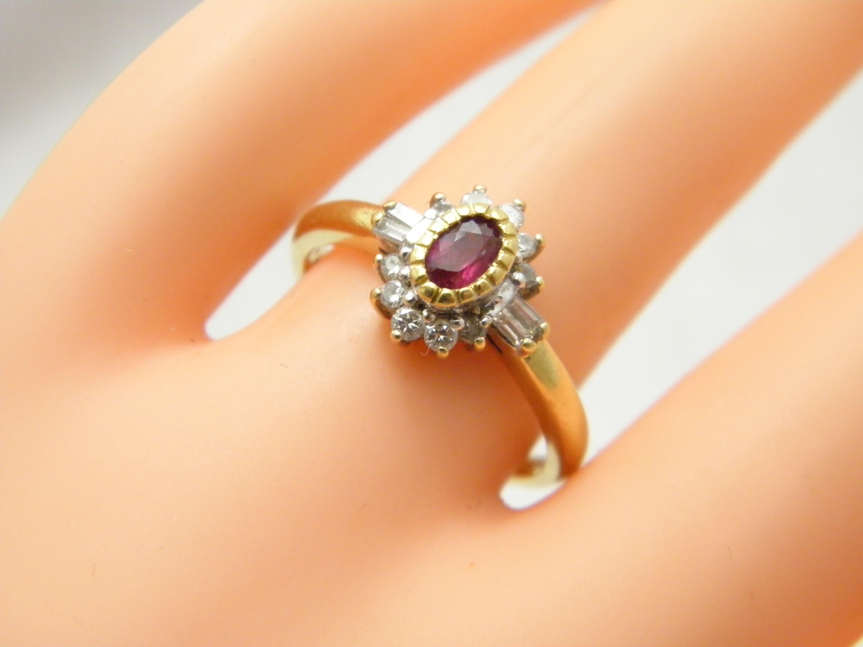 A very special item:
18CT GOLD HEAVY AND THICK RUBY AND DIAMOND CLUSTER RING

DETAILS
Material: 18ct 750/000 Thick Yellow Gold with White Gold accents
This ring has a good thick shank hence ideal if resizing needed
Style: Classic cluster ring with