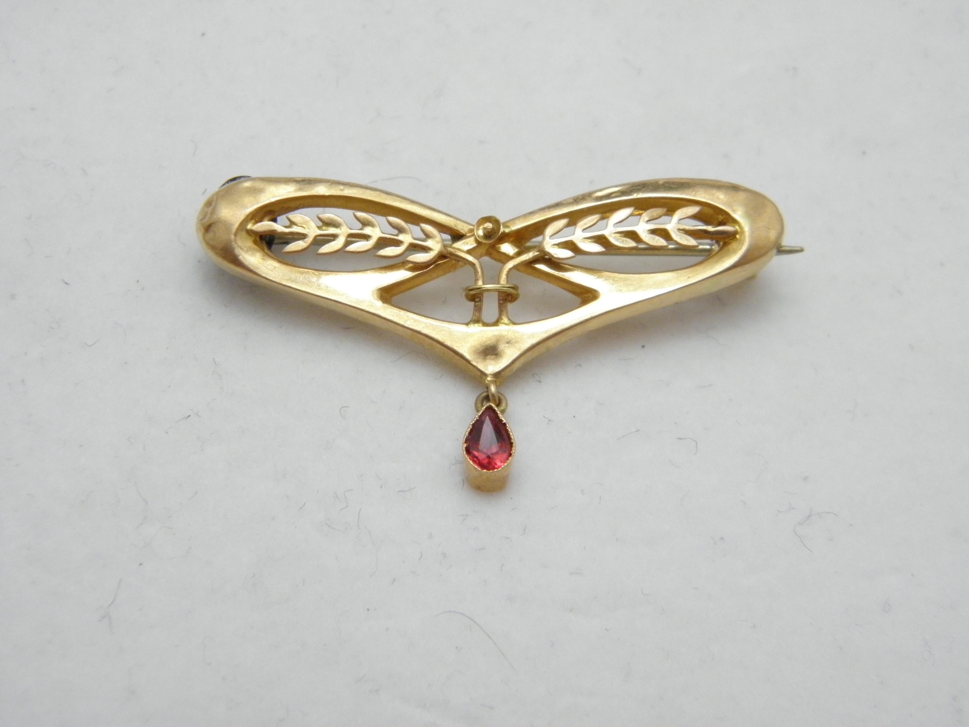 If you have landed on this page then you have an eye for beauty.

On offer is this stunning

18CT SOLID GOLD RUBY HARVEST FESTIVAL BROOCH

DETAILS
Material: 18ct (750/000) Solid Yellow Gold
Style: Harvest brooch with wheat detail and dangling
