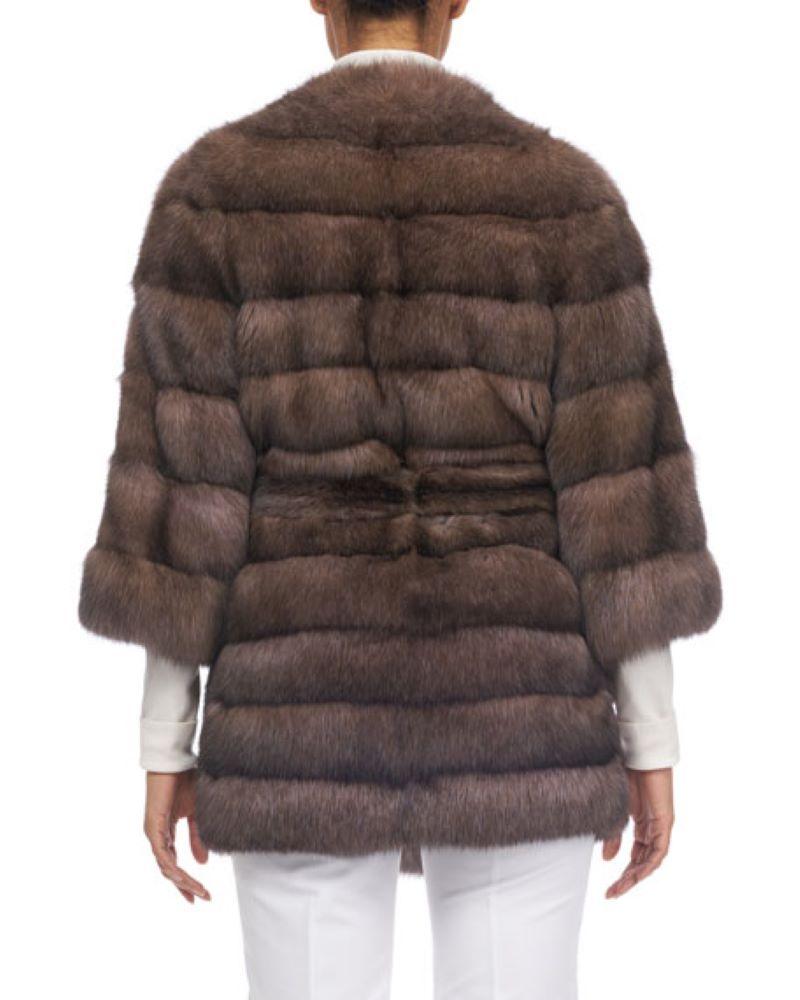 PRODUCT DESCRIPTION:

Brand new luxurious sable fur coat

Condition: Brand New

Closure: None

Color: Brown

Material: Sable

Garment type: Coat

Sleeves: Three-quarter sleeves.

Pockets: None

Collar: Round neckline; single-breasted

Lining: