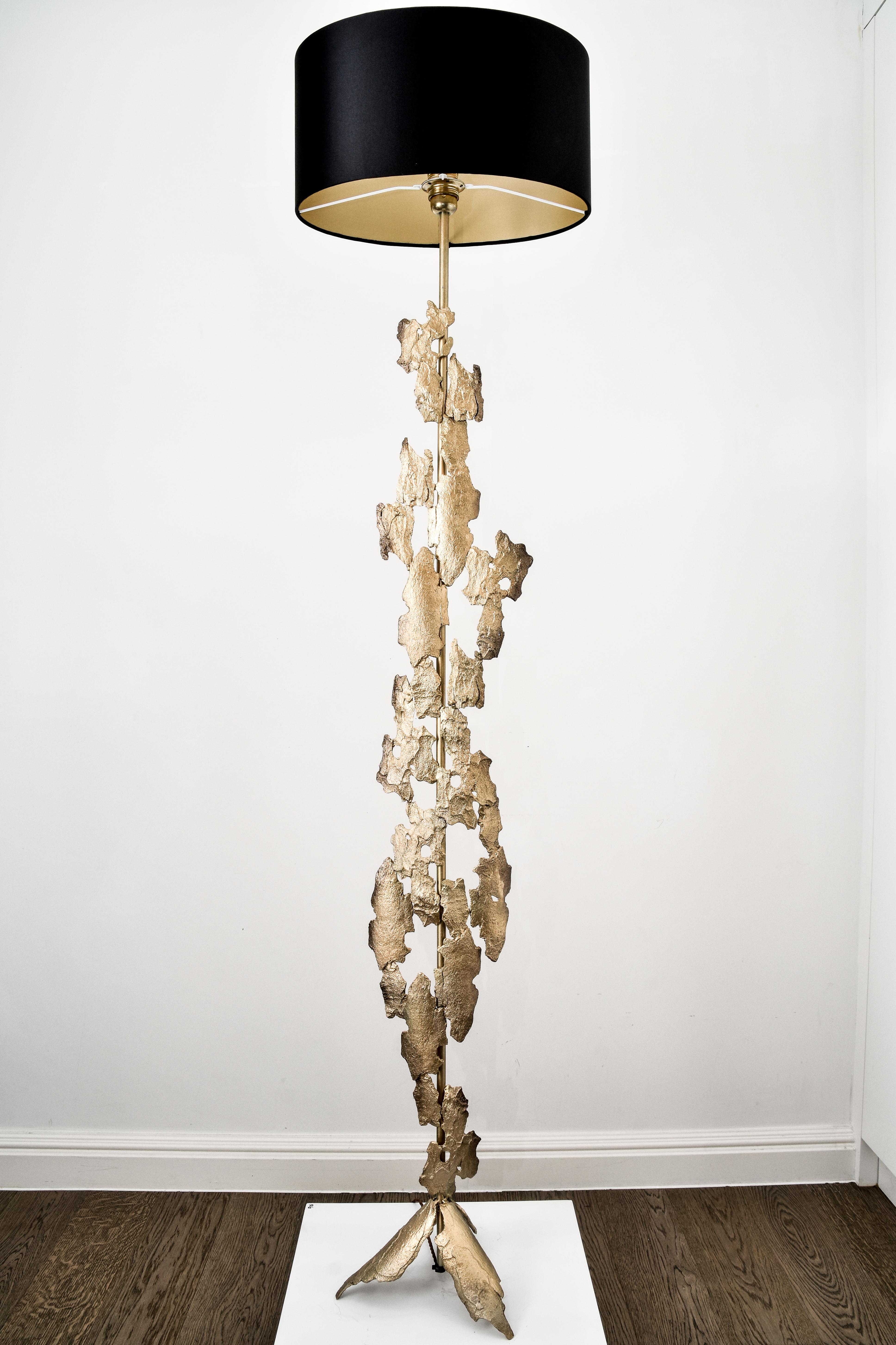 
 One of a kind 'Bark' floor lamp, bronze. 
Tree bark carefully selected from the grounds of national parks around the U.K. Each delicate piece of bark layered with wax before moulding and casting. The natural texture on the outer layer of the bark