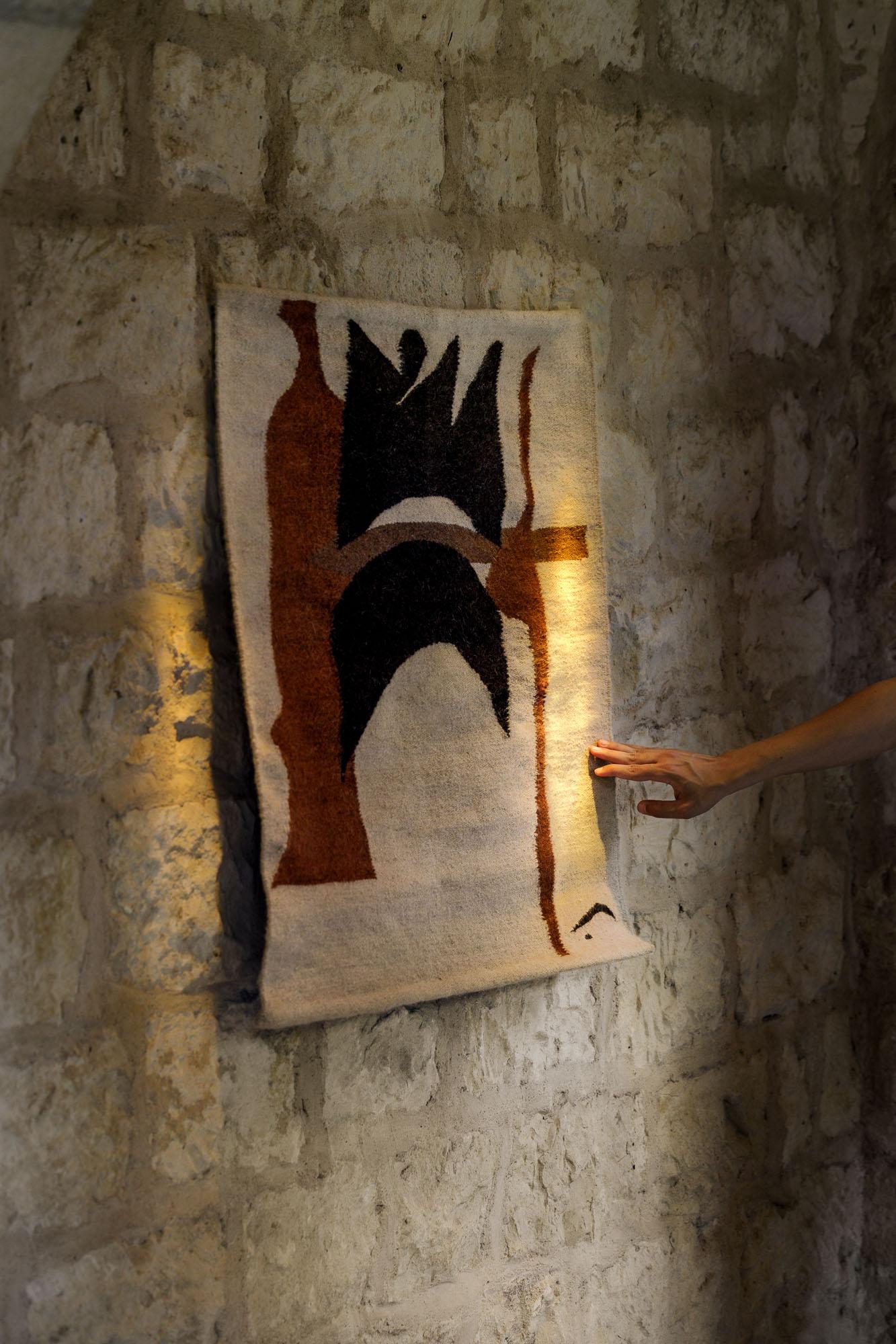 Limited Edition (3 of 4) flat-weave wool wall-hanging in a contemporary design by Salma Barakat. Handcrafted in Egypt in collaboration with a charity organisation that empowers women by training them with weaving skills and providing a regular
