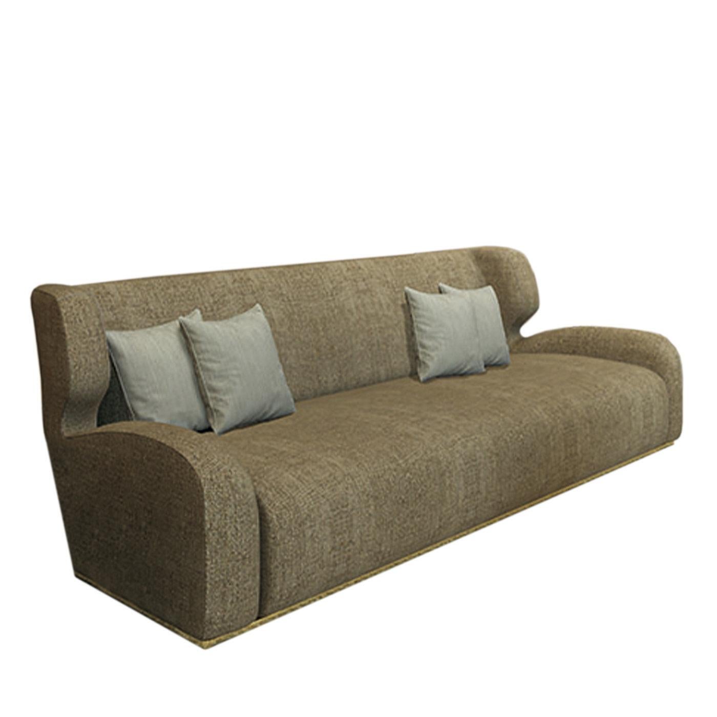 A charming and timeless design by Giannella Ventura dedicated to American cartoonist and partner Barks, this sofa will effortlessly adorn any stylish modern interior. Mounted on a shiny brass base, it is defined by soft and welcoming lines