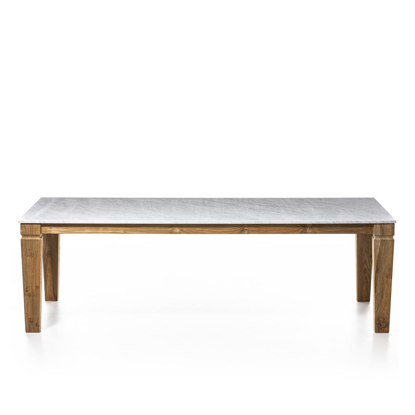 Dining table Barletta with white carrara marble top
and with solid teak wood. For outdoor or indoor use.
