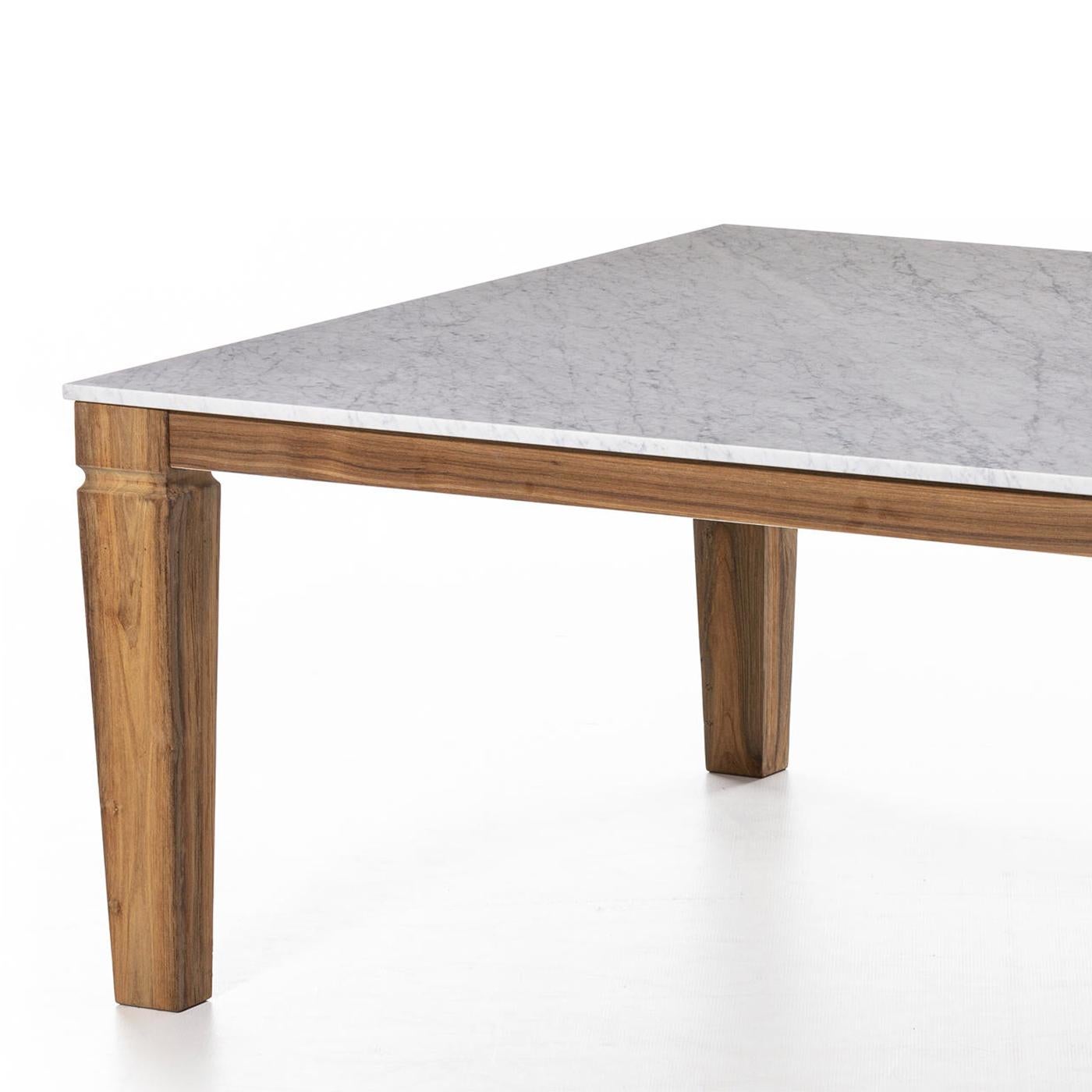 Dining Table Barletta square with structure in solid teak
wood and with polished carrare white marble top.