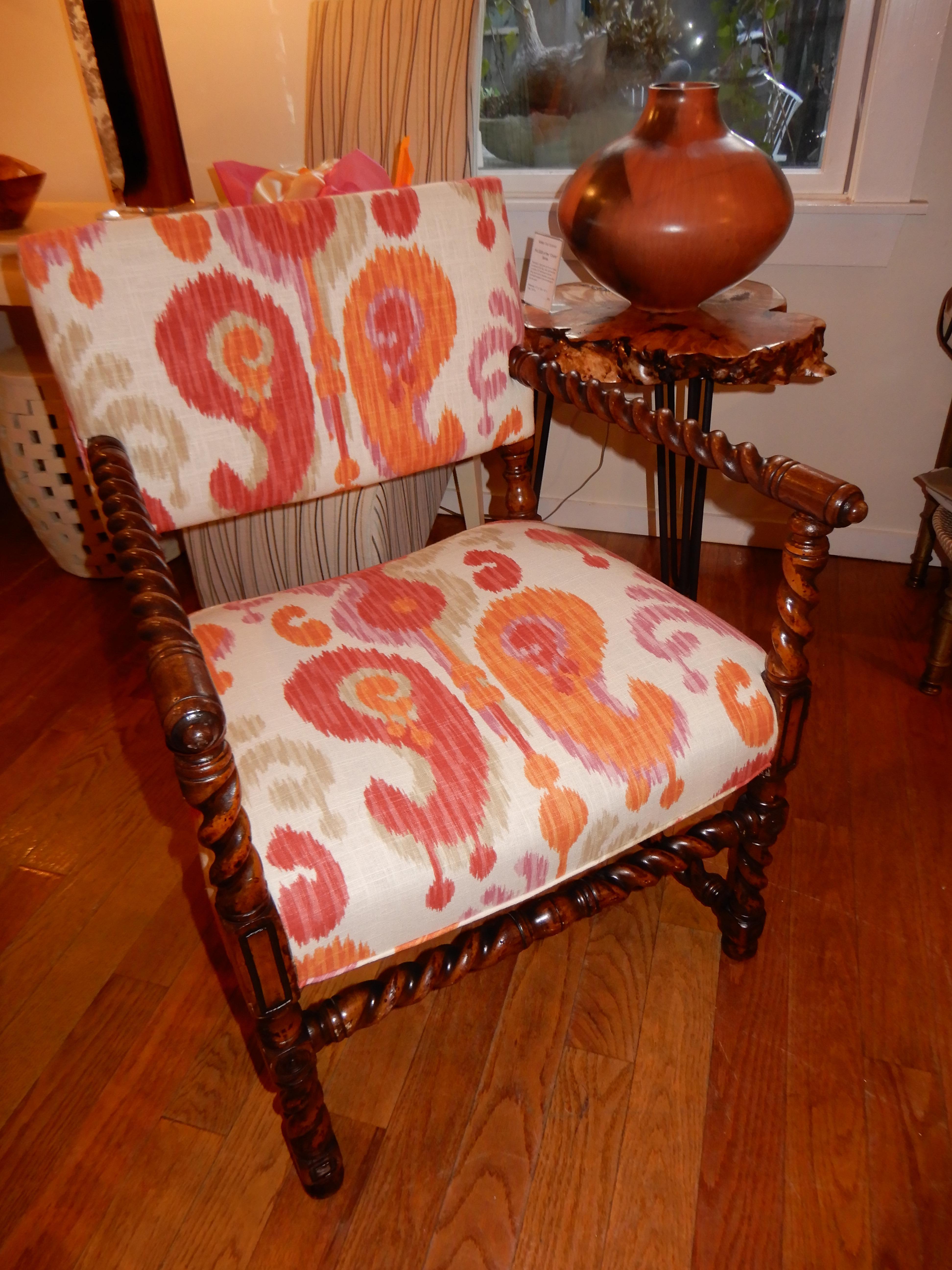 A 19th century George Hunzinger barley twist arm chai,r hand crafted in American oak woods,excellent condition,new upholstery in an exciting Ikat linen fabric which brings this
aethetic movent chair into the 21st century,Comfortable and would work