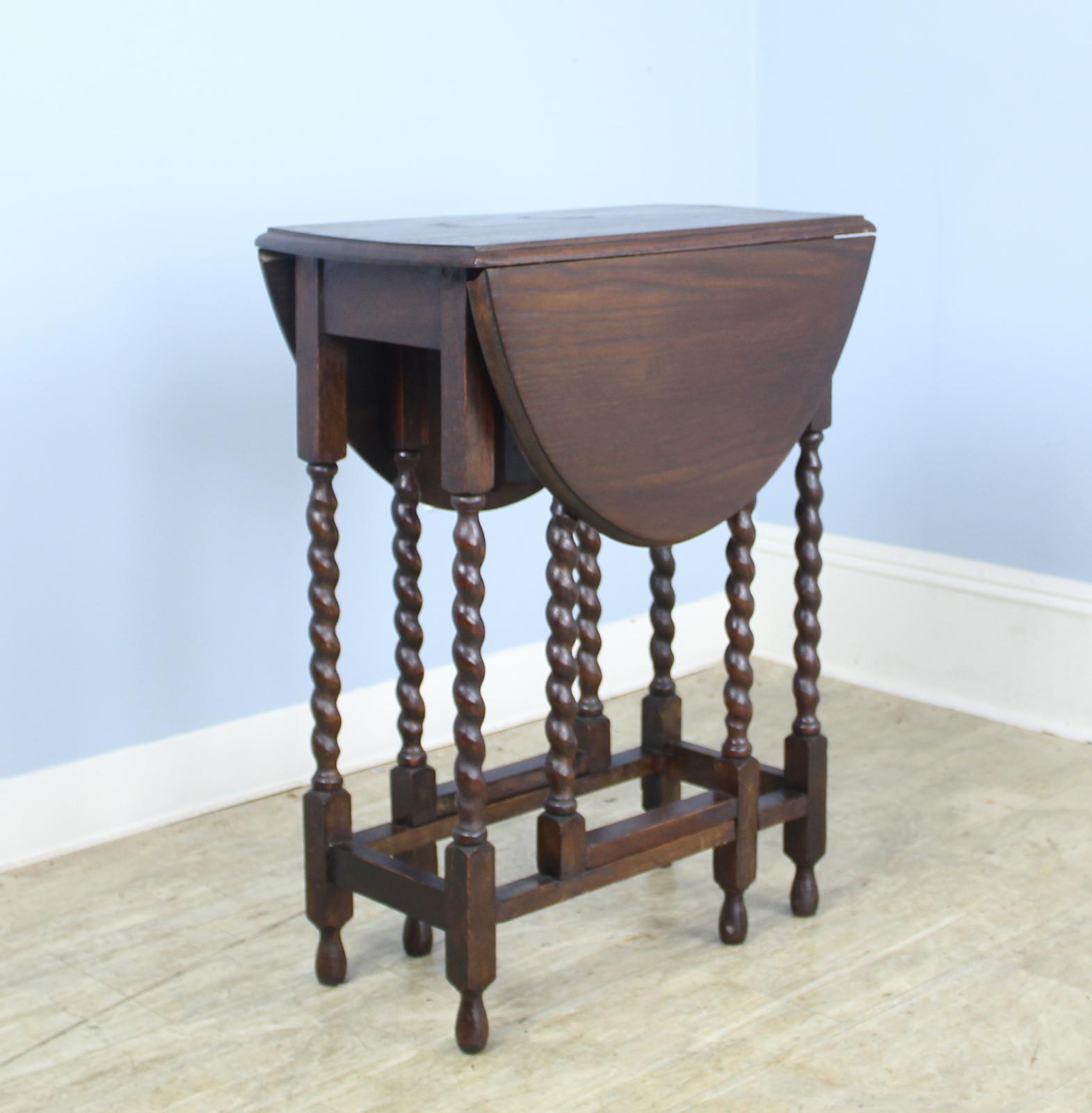 This is an excellent example of the classic. It is a smaller size, suitable as a small breakfast table, fine for a tea table. Good dark color and nice patina; turnings are eye catching. It is appropriate as a side, lamp or end table. Additionally,