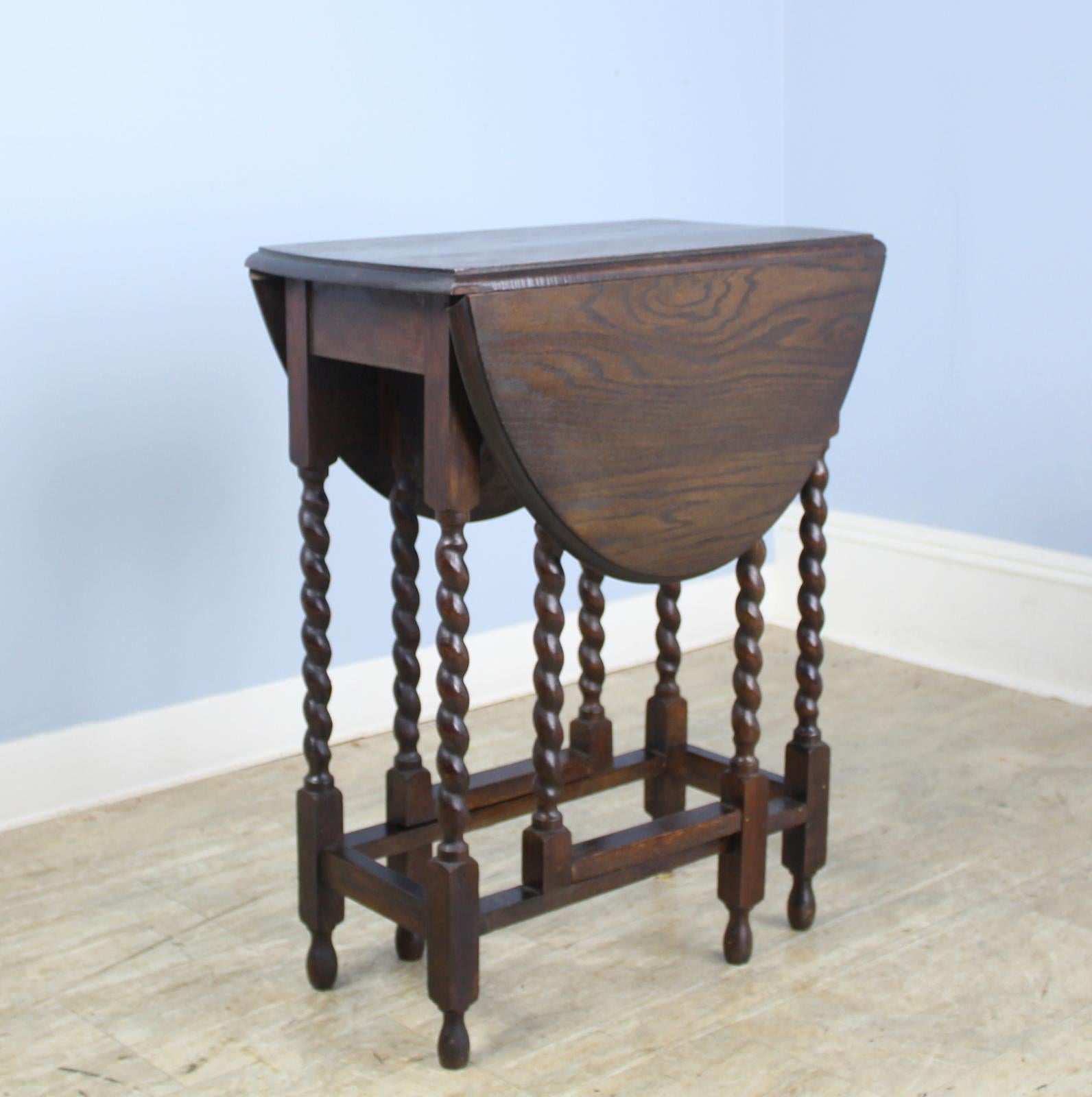 This is an excellent example of the classic. It is a smaller size, suitable as a small breakfast table, fine for a tea table. Good dark color and nice patina; turnings are eye catching. It is appropriate as a side, lamp or end table. Additionally,
