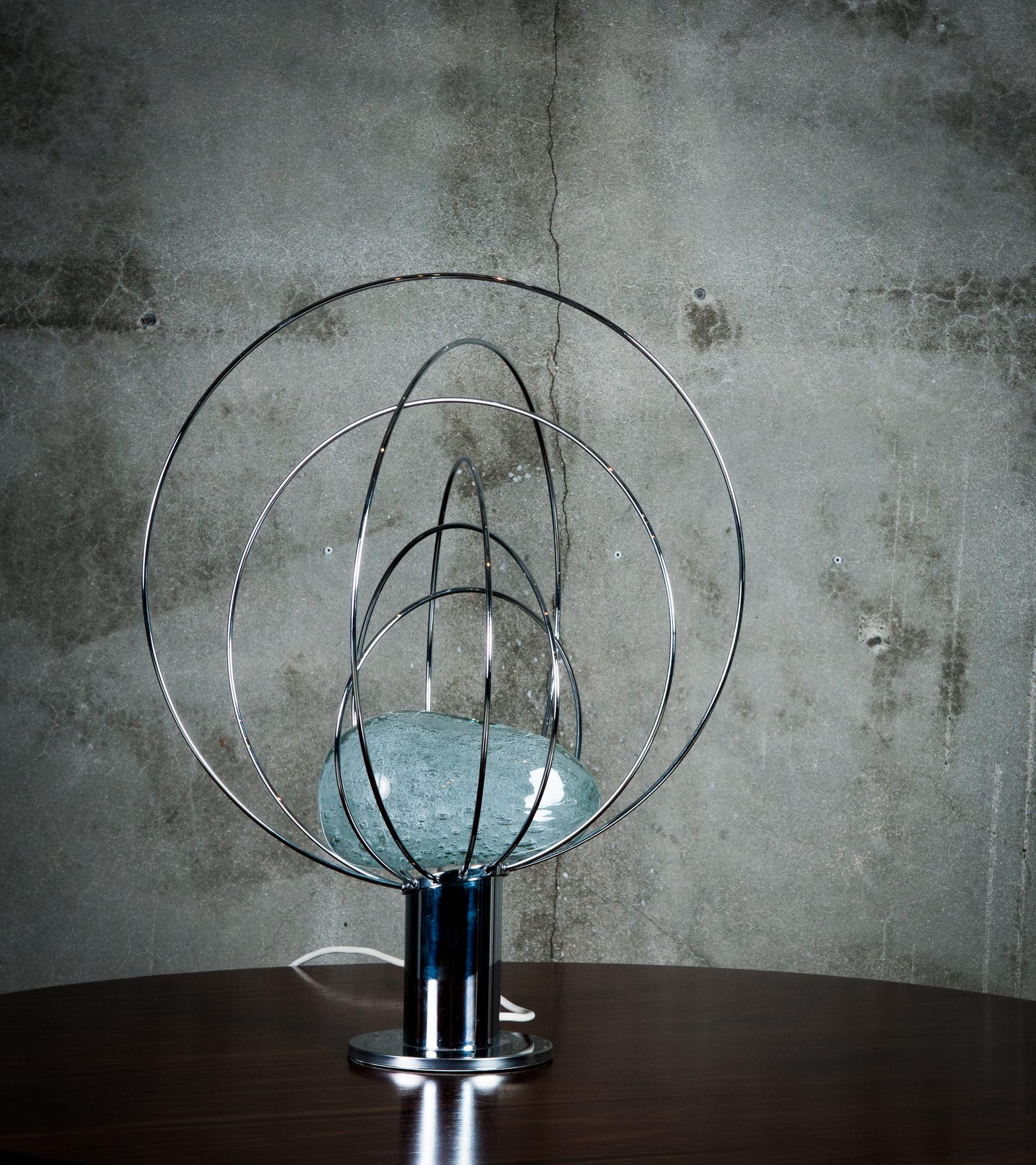 One Angelo Brotto 'Barnada' table lamp in chrome-plated steel and Murano glass. From Esperia, Italy circa 1970.
