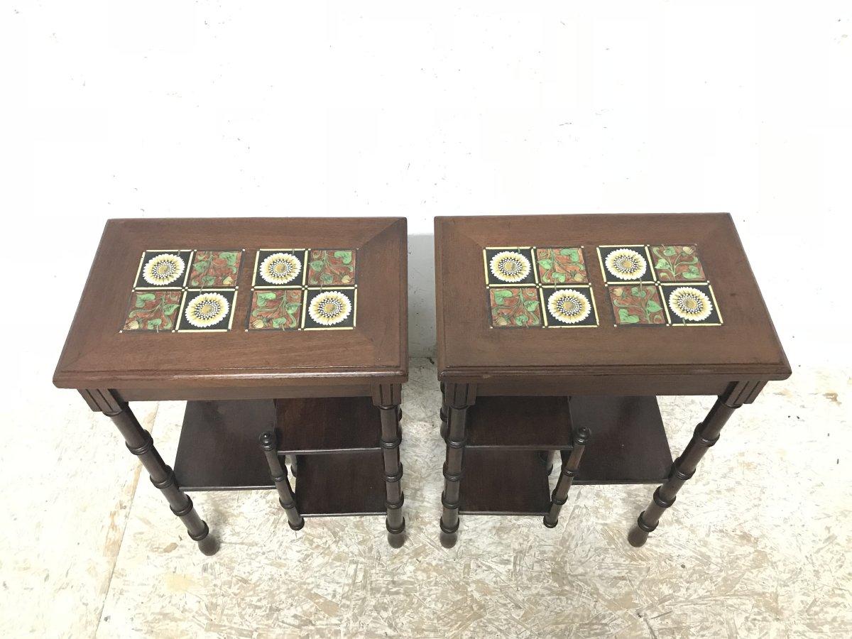 Thomas Jeckyll attributed. Barnard Bishop and Barnard.
A pair of Anglo-Japanese side tables inset with Barnard Bishop and Barnard sunflower tiles. 
With ring turned simulating bamboo legs and an unusual fifth central turned leg supporting the three