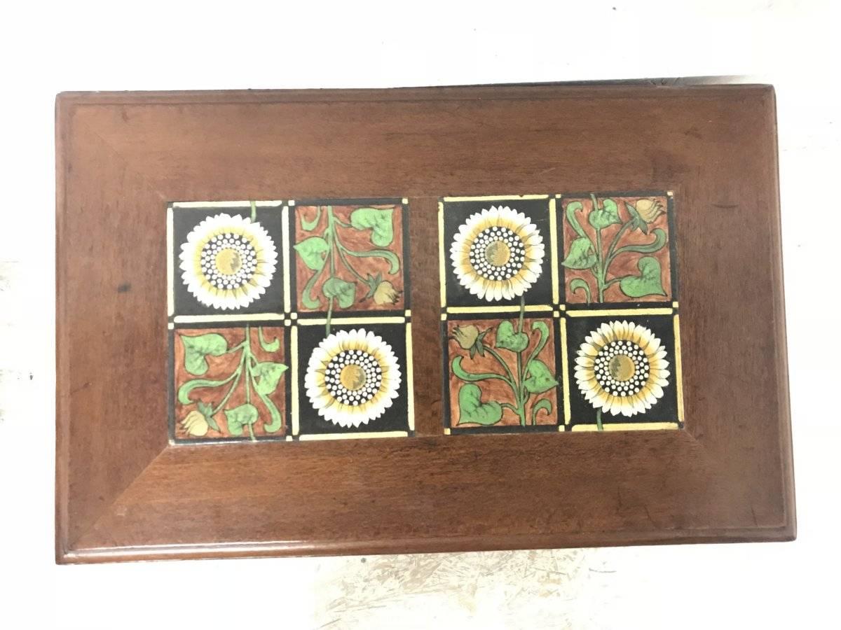 English Thomas Jeckyll. A Pair of Anglo Japanese Side Tables inset with Sunflower Tiles. For Sale