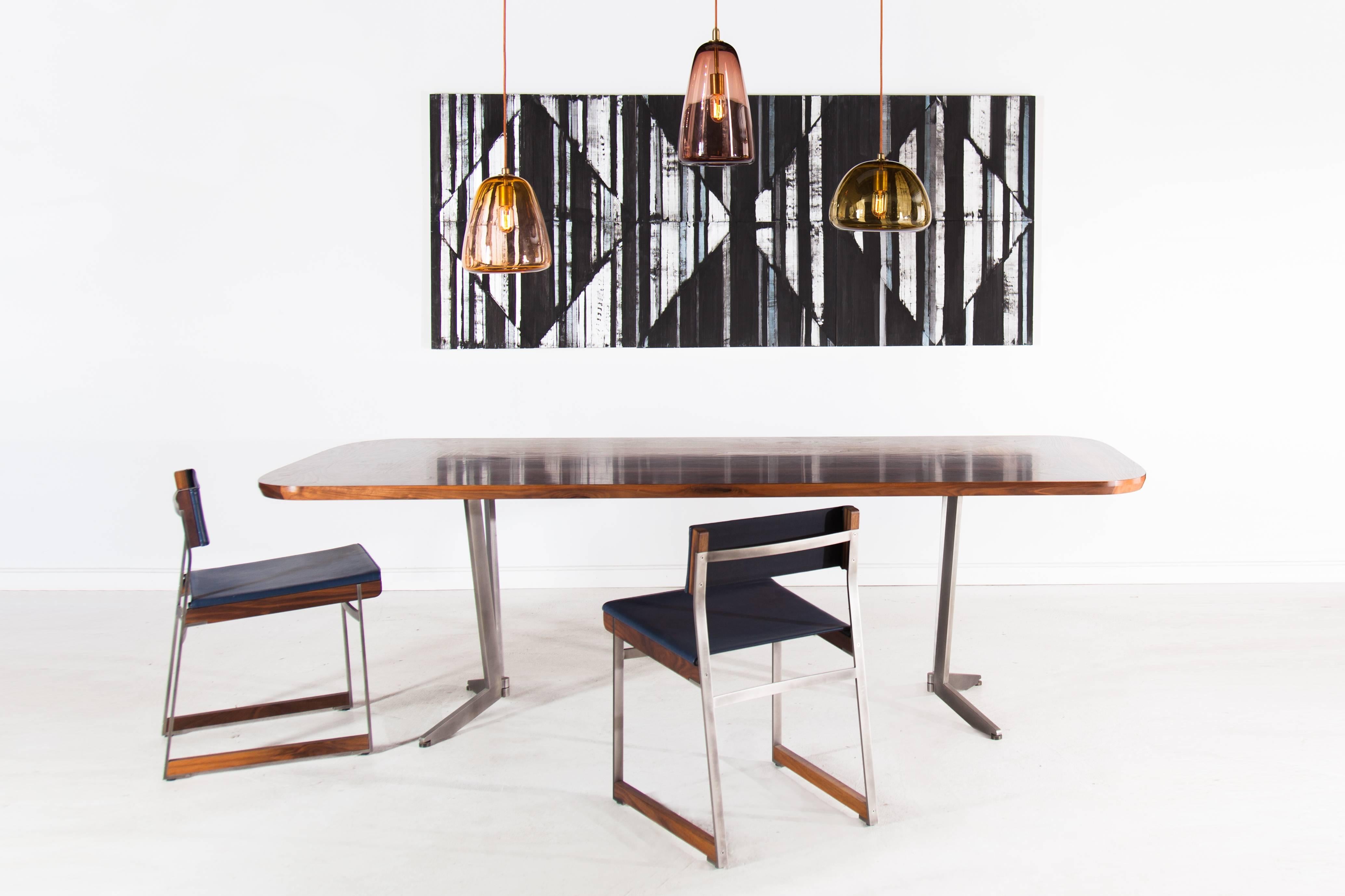 Inspired by op art and geometric textiles, the Barnet Table employs traditional marquetry techniques to merge furniture with painterly graphic images. Available in a variety of American hardwoods with surface patterns ranging from simple flat sawn