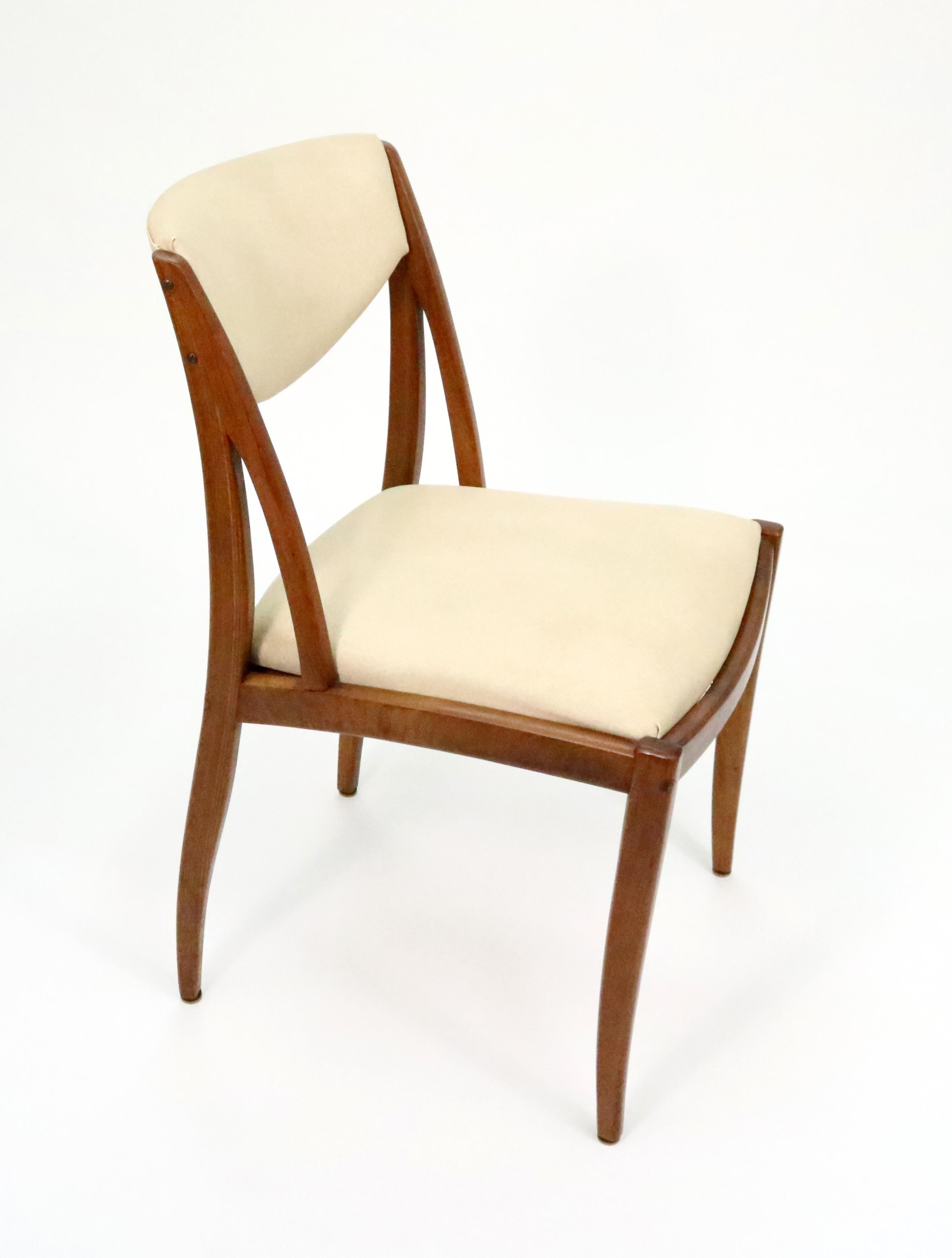 A rare set of Drexel Parallel sculptural dining chairs by Barney Flagg. USA, 1960s.

Set of 7.

Arm chair dimensions: 20.5