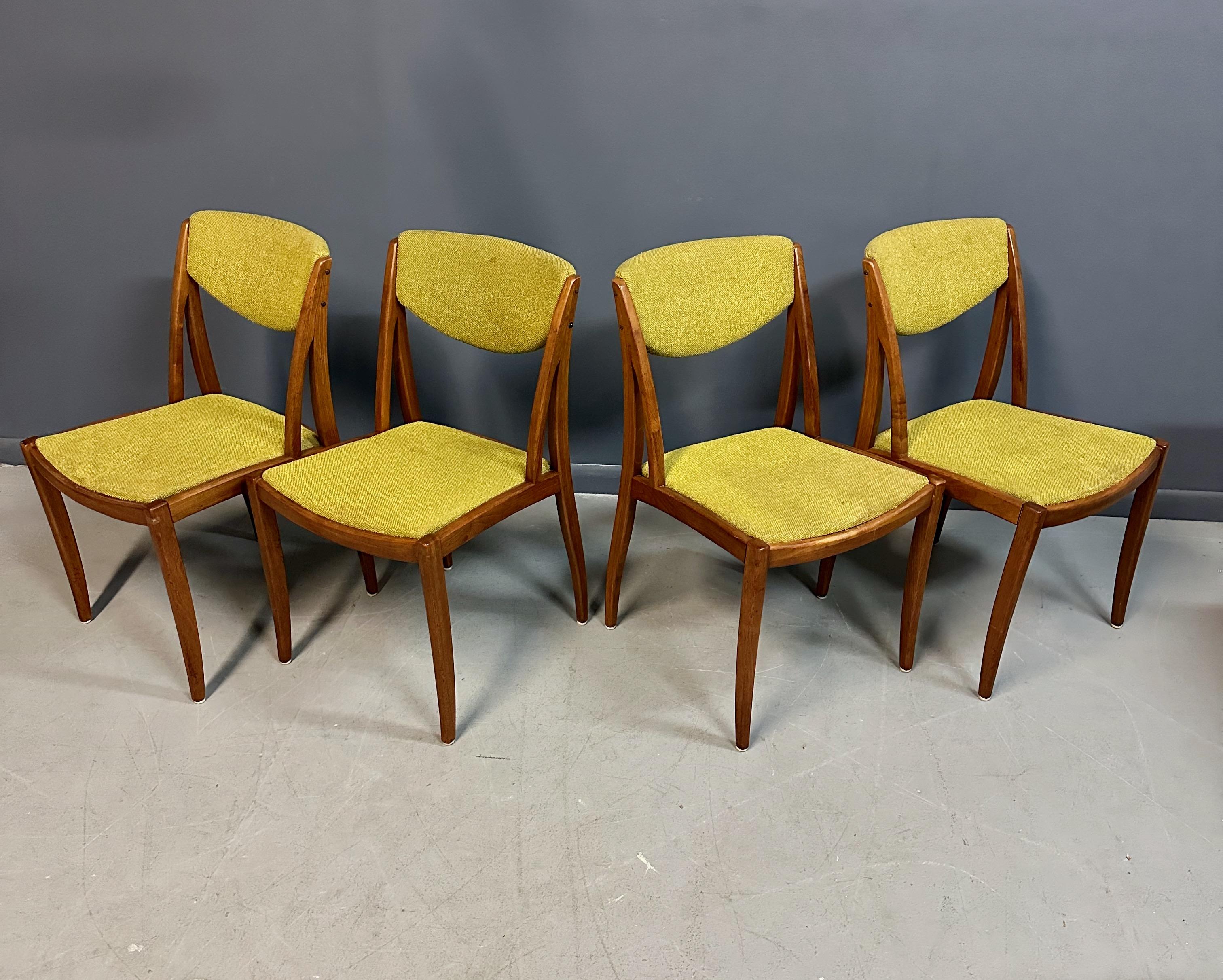 Experience midcentury modern style and comfort with Barney Flagg for Drexel Midcentury Dining Chairs. Built of lovely warm walnut and designed by an industry expert, these chairs offer both durability and aesthetics for your dining room. Elevate