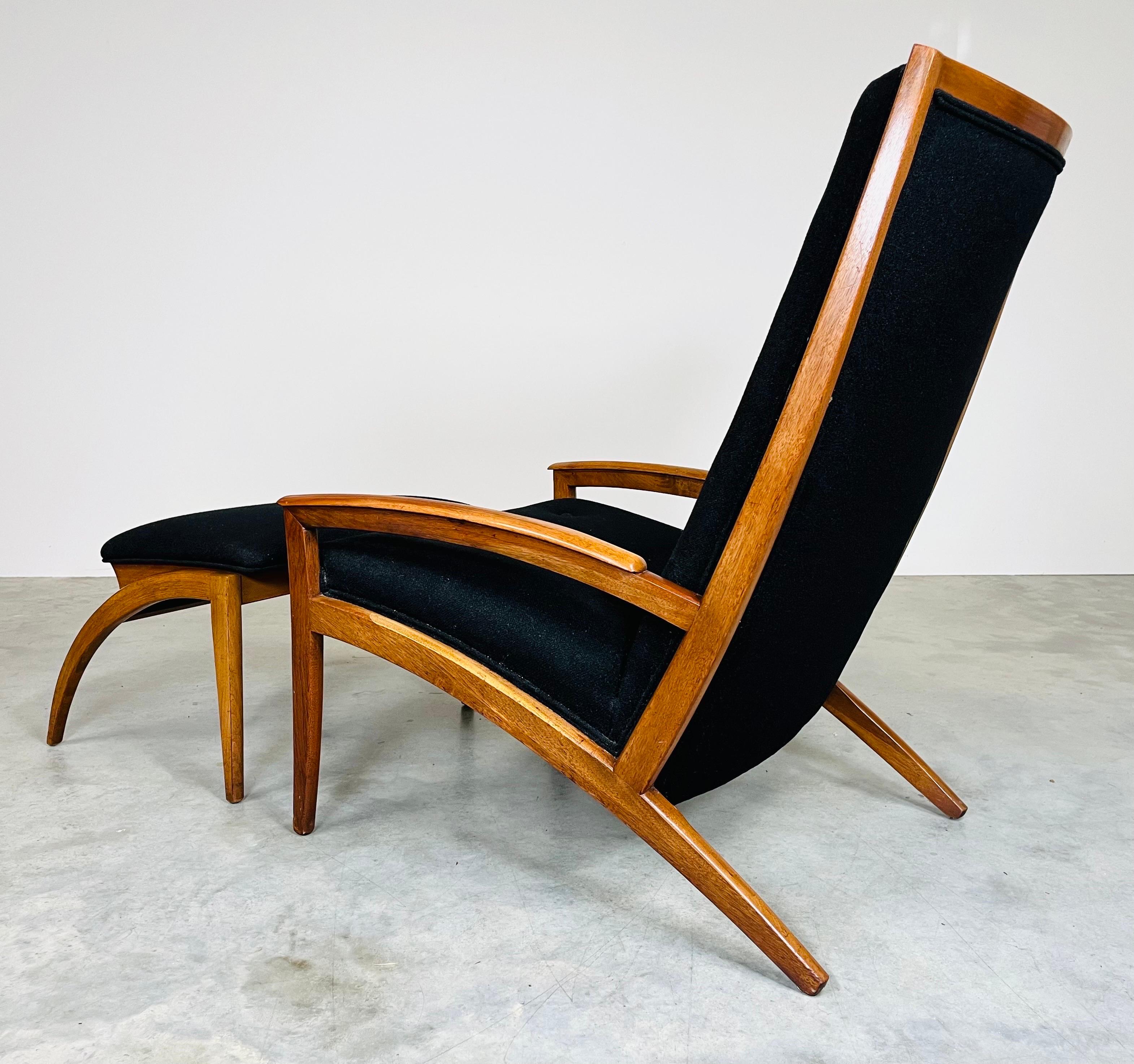 Mid-Century modern walnut “Parallel” lounge chair and ottoman set having sculptural lines with black tweed upholstery and tufted backrest. Designed by Barney Flagg for Drexel circa 1960. 
In very good vintage condition having very minor signs of