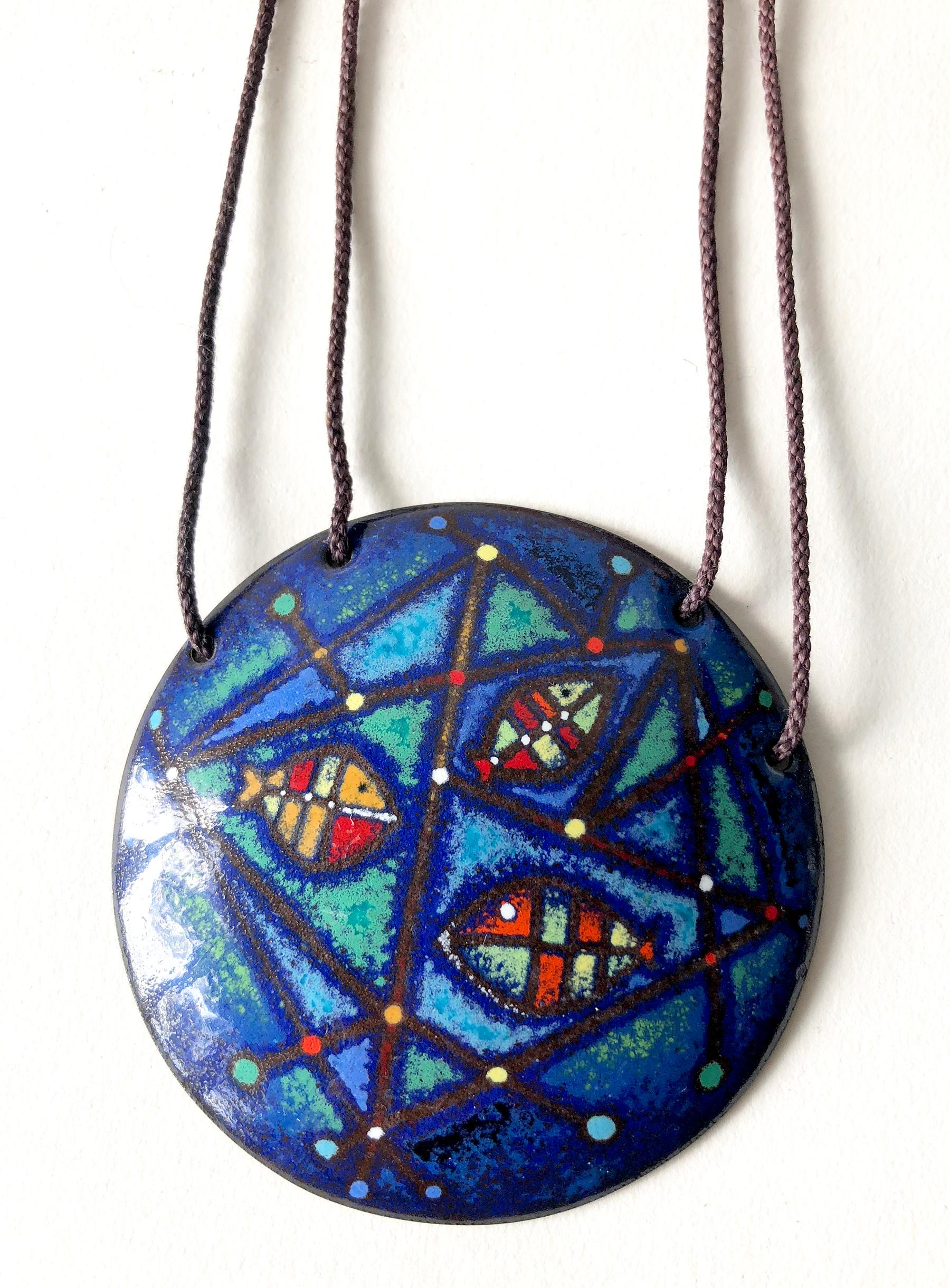 Abstract fish design in enamel over copper pendant necklace created by Barney Reid of San Diego, California.  Pendant measures 2 7/8